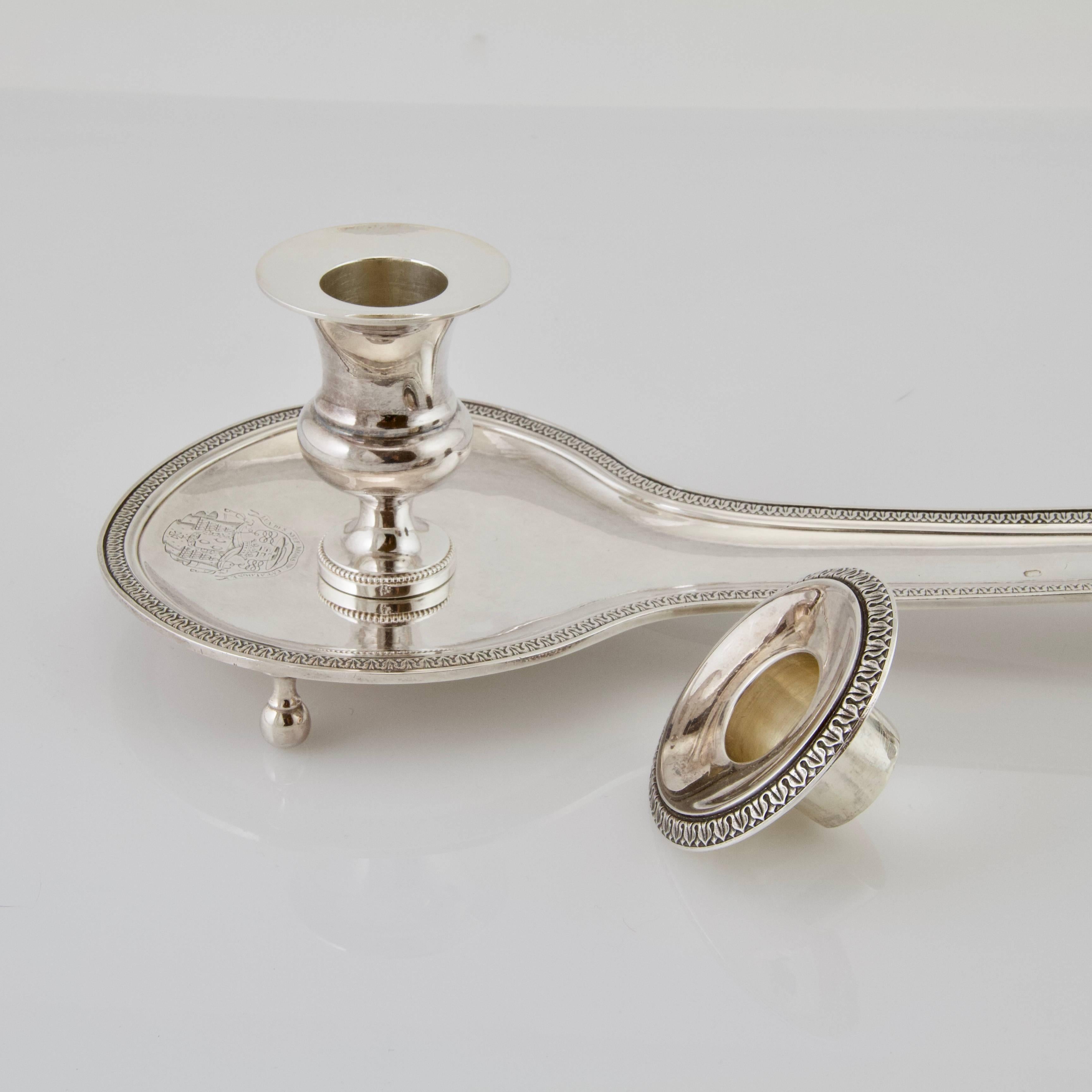 Very unusual and rare bishop candlestick. 
Shaped as a chamberstick with a long handle for a candle supply. Prayer's time lasted longer than burning time of a candle. The supply, containing the second candle, allowing to replace easily the candle