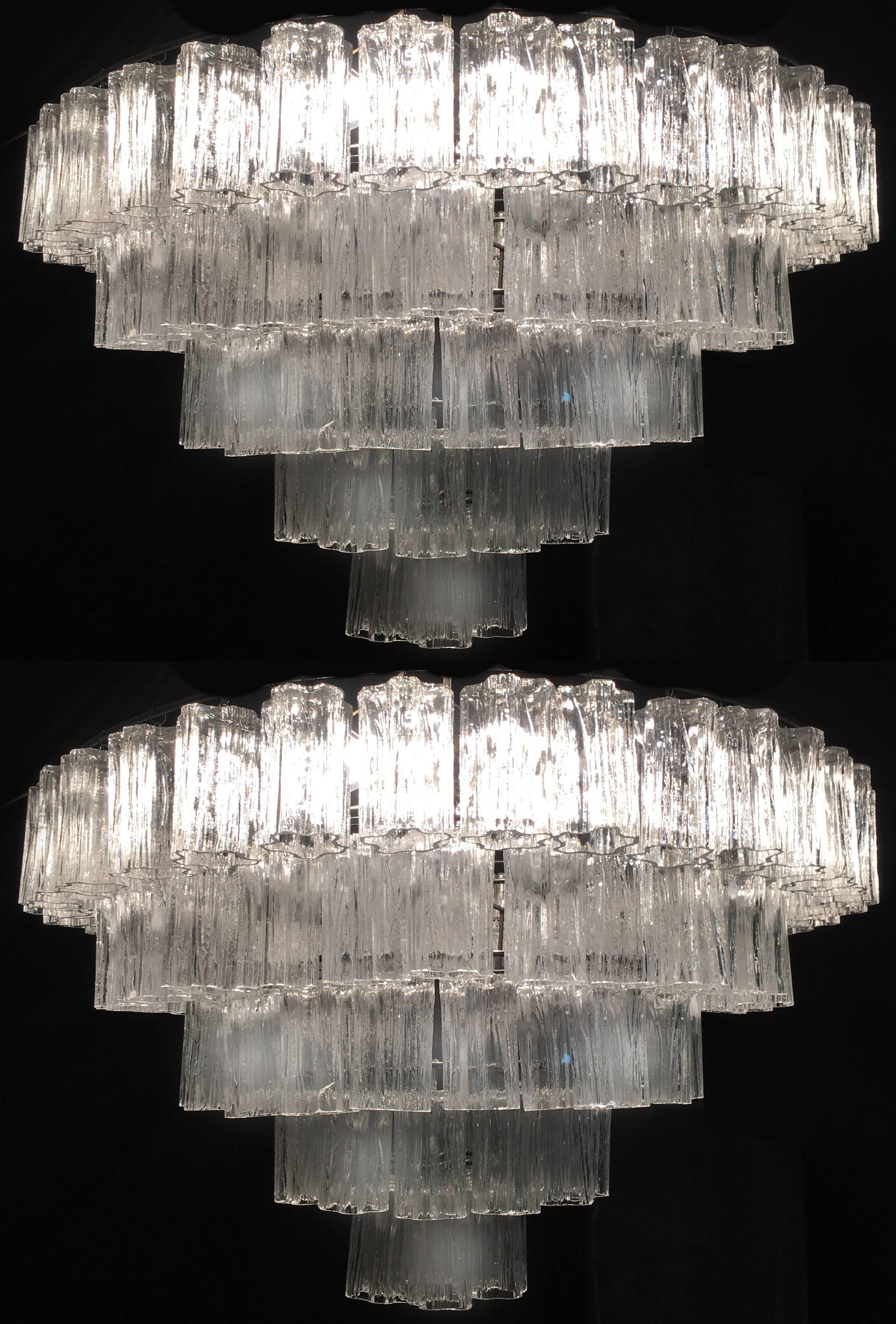 A very fine chandelier in the style Toni Zuccheri for Venini, each one composed by 78 truncated handblown cylindrical glass pieces. Measures: Height each 15 cm.