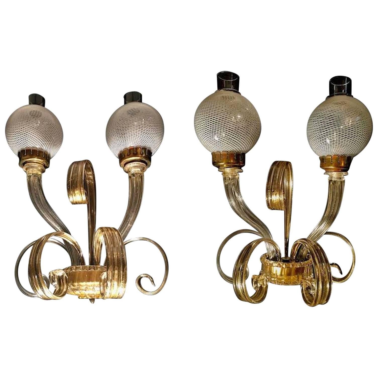 There are no words to describe this wall lights. To exalt at the same time a luxurious and refined space. Together with two other pairs of sconces are from a historic Italian hotel.