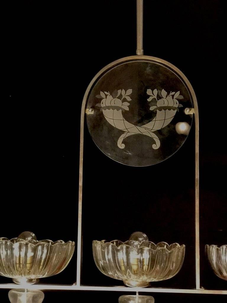 Art Deco Italian chandelier by Ercole Barovier, 1940. 
It is a very rare piece. The engraving on glass of two cornucopias is remarkable.