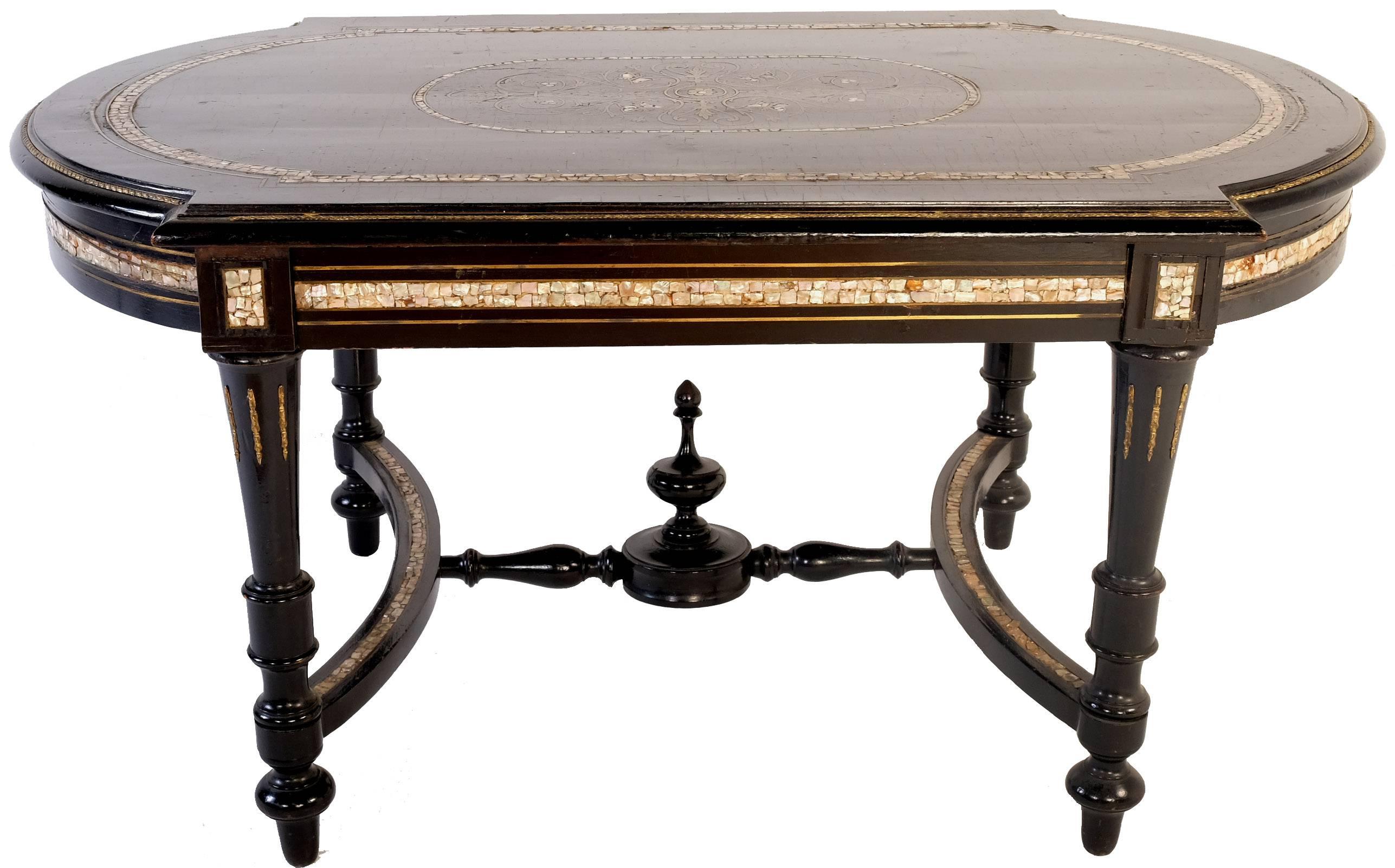 Antique sofa table in the Napoleon III manner, totally ebonized with gilt bronze decorative moldings and Boulle style marquetry in the centre of the upper leaf.