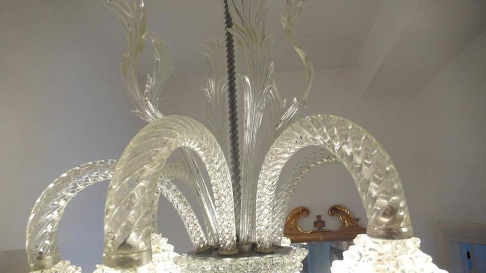 Chandelier realized by the famous glass artist Ercole Barovier. The chandelier looks powerful and cluttered with transparency. What it takes to turn a room into a cathedral of light. From the private collection of Baron Von Plant.