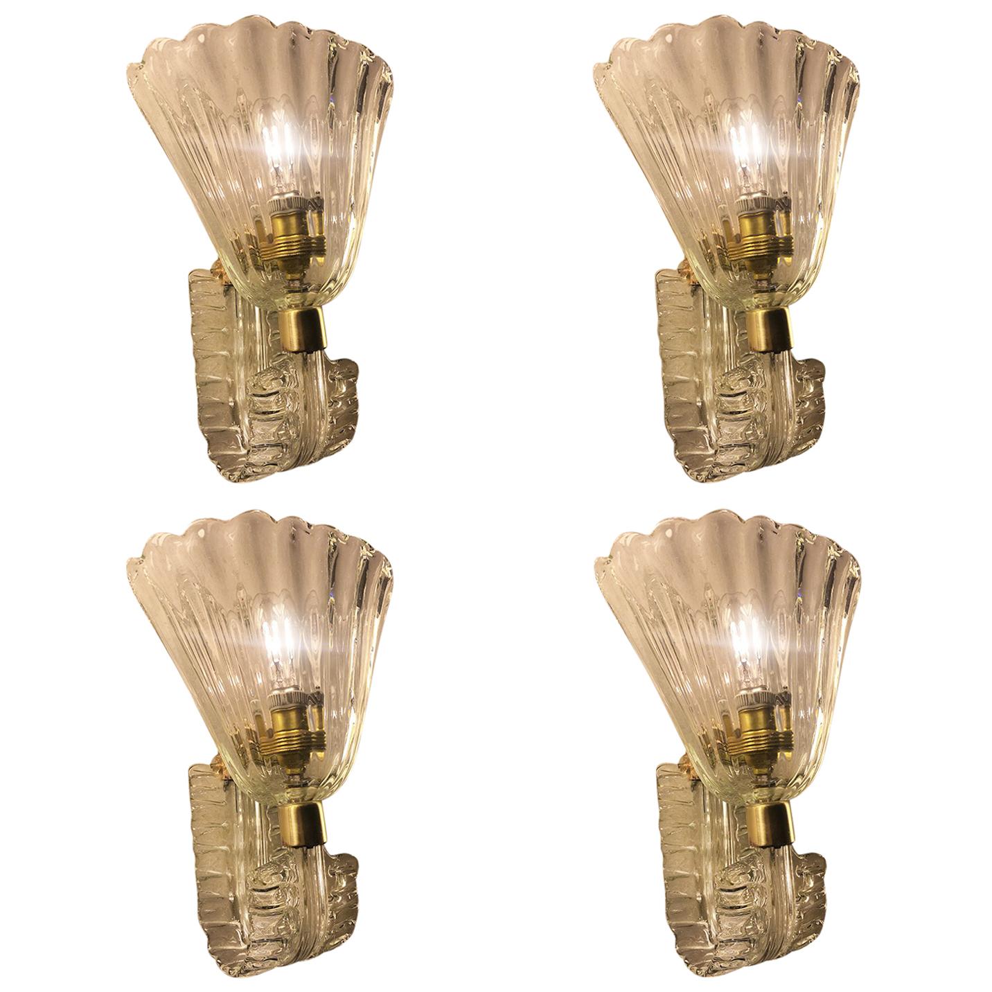 A spectacular pair of Barovier & Toso sconces. Each sconce has one light and brass hardware.