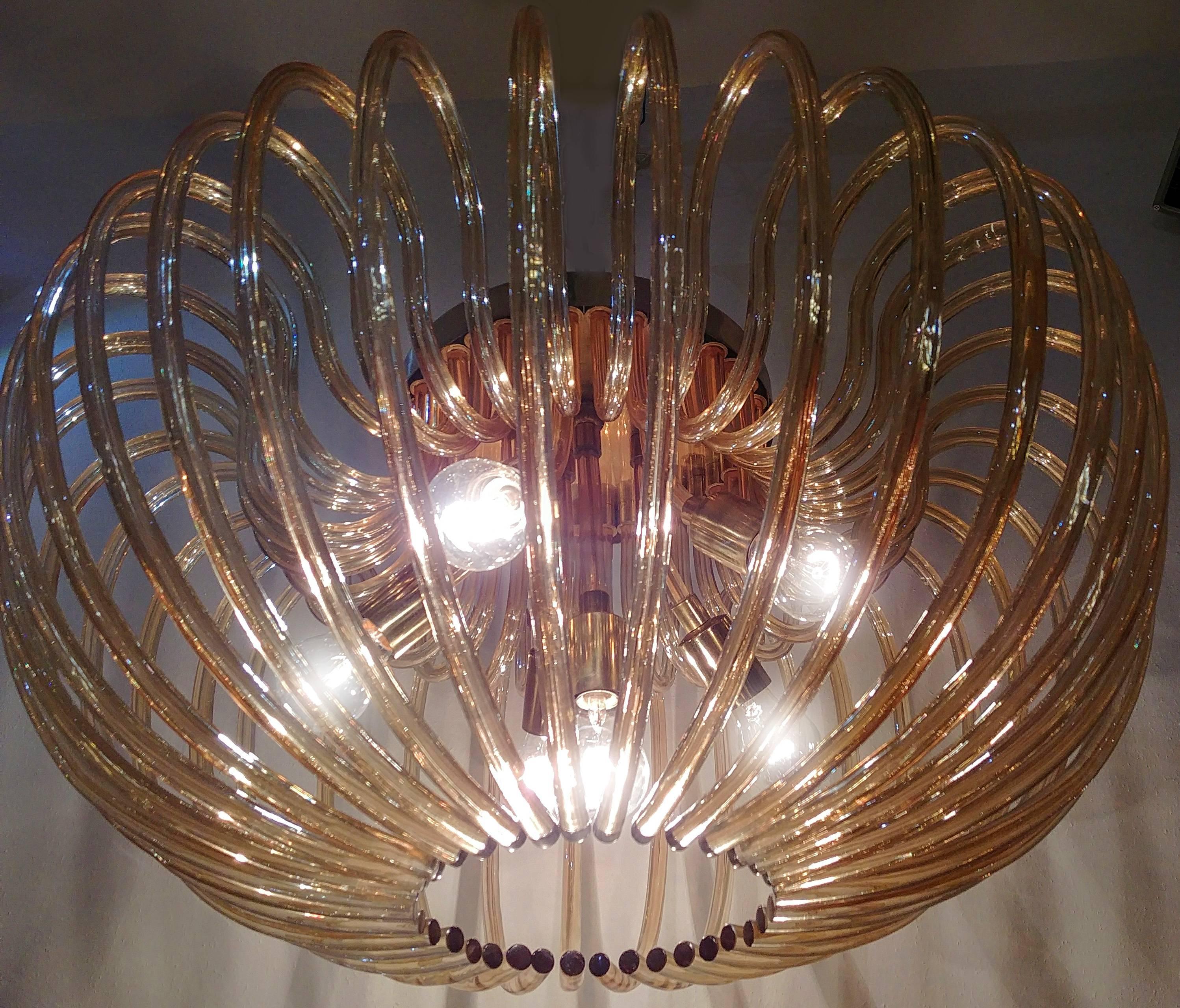Precious Murano chandelier, consisting of 36 curved glasses, with brass structure.
