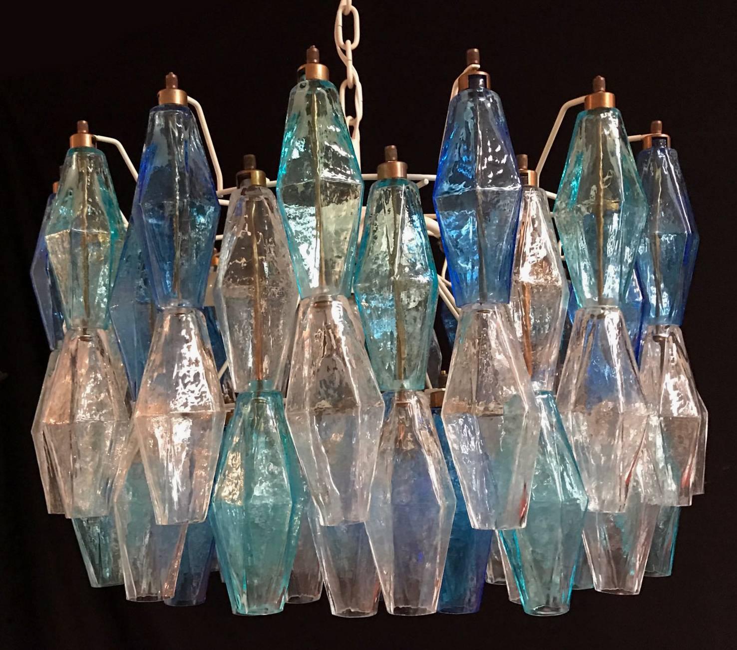 The chandelier consist of 52 colorful Poliedri of Murano. Ice, blue and aquamarine. Measures: cm H 80 L. 50 W. 35 height lights, without chain 30 cm. Available three pairs.
