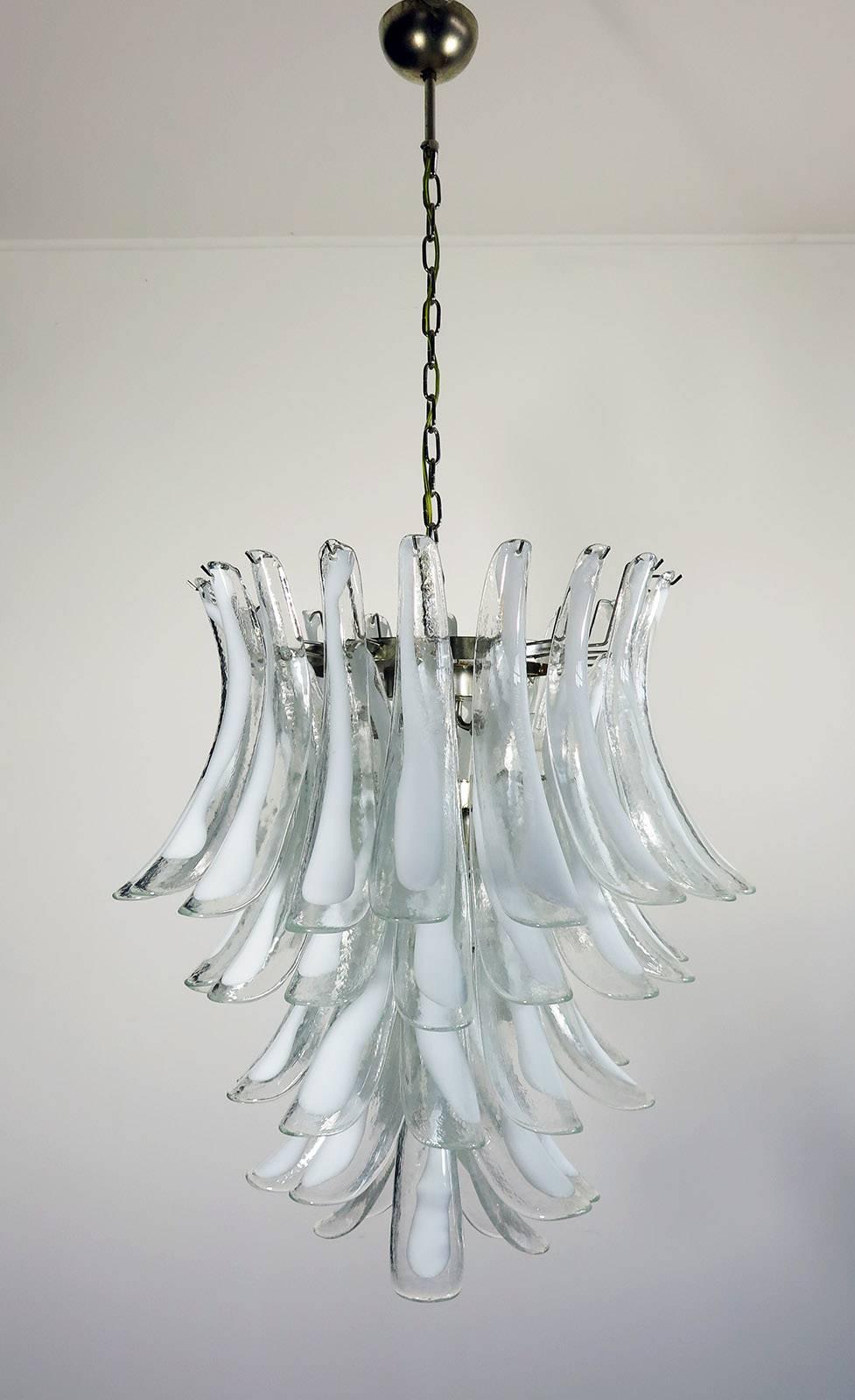 Huge Italian vintage Murano chandelier made by 52 glass petals (transparent crystal, smooth outside, with crystal powder and then rough inside
Period: 1970s-1980s

Dimensions: 55.10 inches (140 cm) height with chain; 29.50 inches (75 cm) height