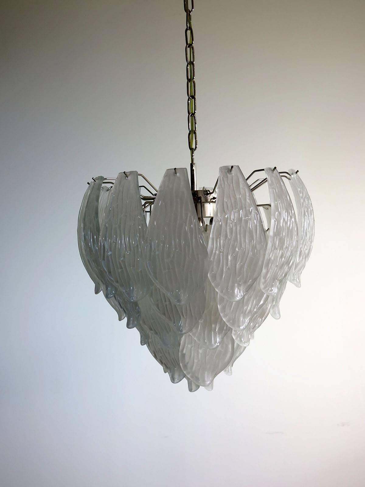 Huge Italian vintage Murano chandelier made by 41 handblown transparent frosted carved glass leaves in a 
chrome frame.

Dimensions: 49.20 inches (125 cm) height with chain; 25.80 inches (68 cm) height without chain; 21.25 inches (54 
 cm)