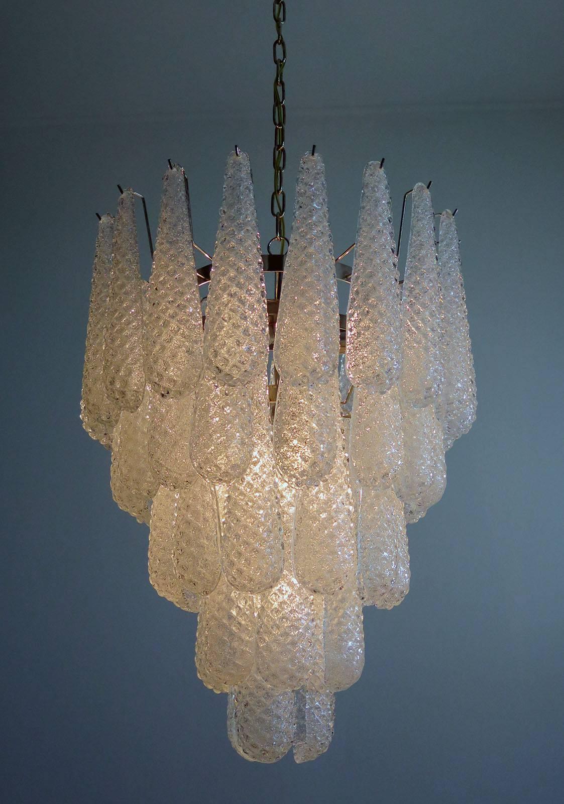 Huge Italian vintage Murano chandelier made by 52 glass petals (transparent crystal, smooth outside, with crystal powder and then rough inside in a chrome frame.
Period: 1970s-1980s

Dimensions: 55.10 inches (140 cm) height with chain, 29.50 inches