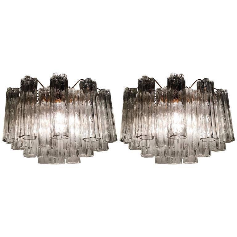 A very fine pair of sconces in the style Toni Zuccheri for Venini, 18 handblown glass tubes on each sconce, each measuring 9.84” long.