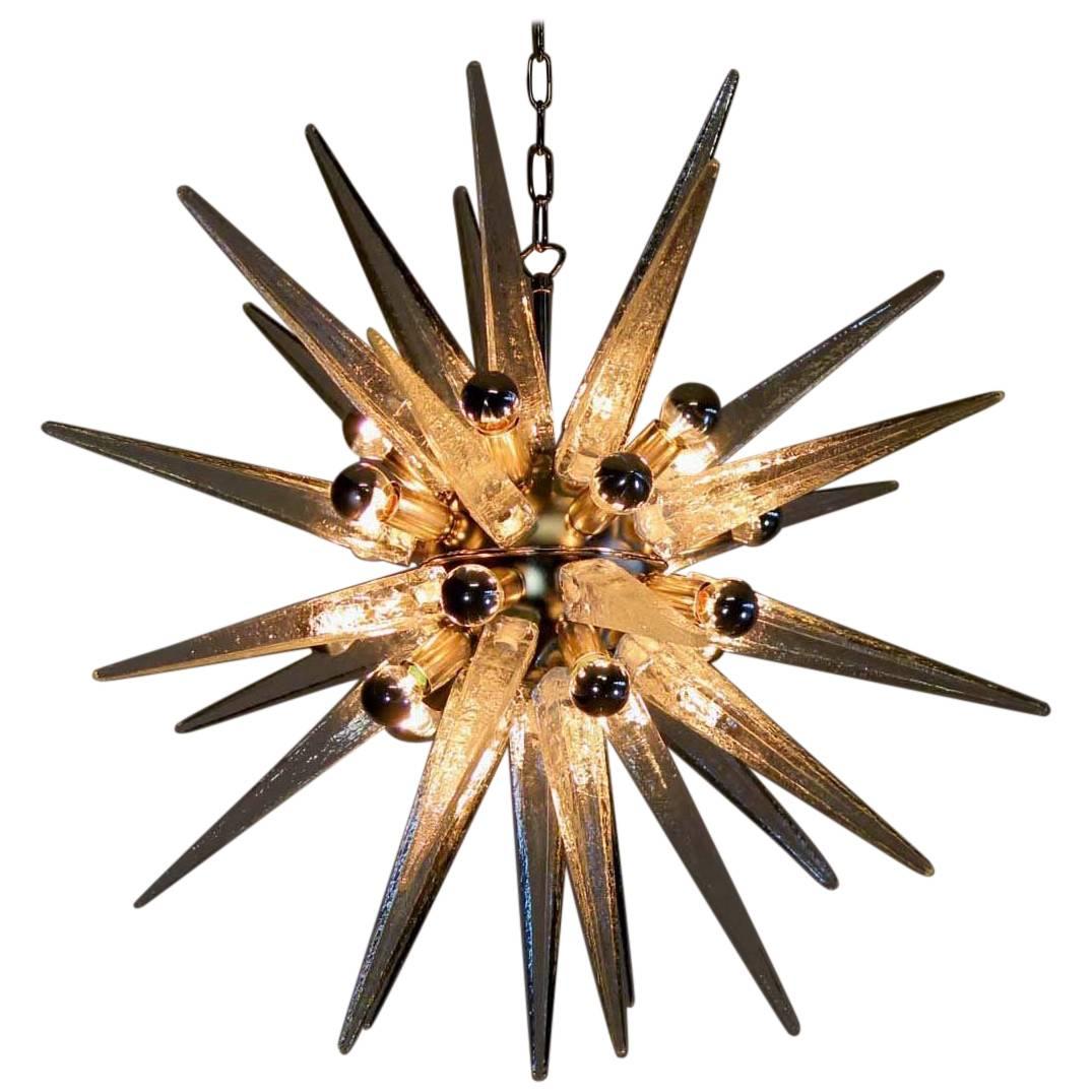 Italian Sputnik chandelier in a nickel frame, clear Murano glass (31 elements). Murano blown glass in a traditional way. 20-light points.
Dimensions: 51.20 inches (130 cm) height with chain; 31.50 inches (80 cm) height without chain; 31.50 inches