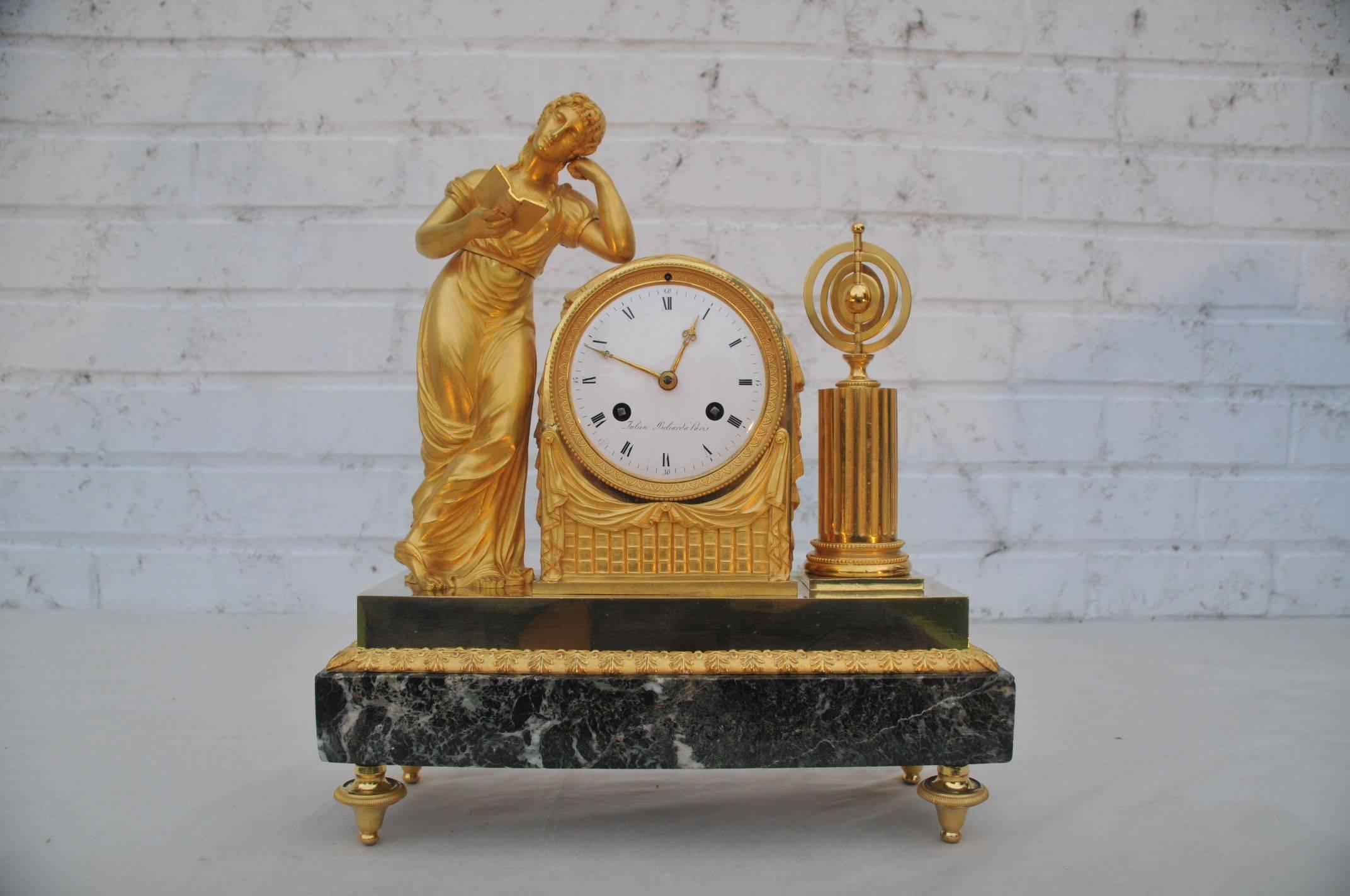 France, circa 1790, signed Julien Béliard à Paris.
In working condition, delivered with pendulum and key.
The circular Roman enamelled dial within a rectangular draped case containing the movement with silk suspended pendulum and striking on bell,