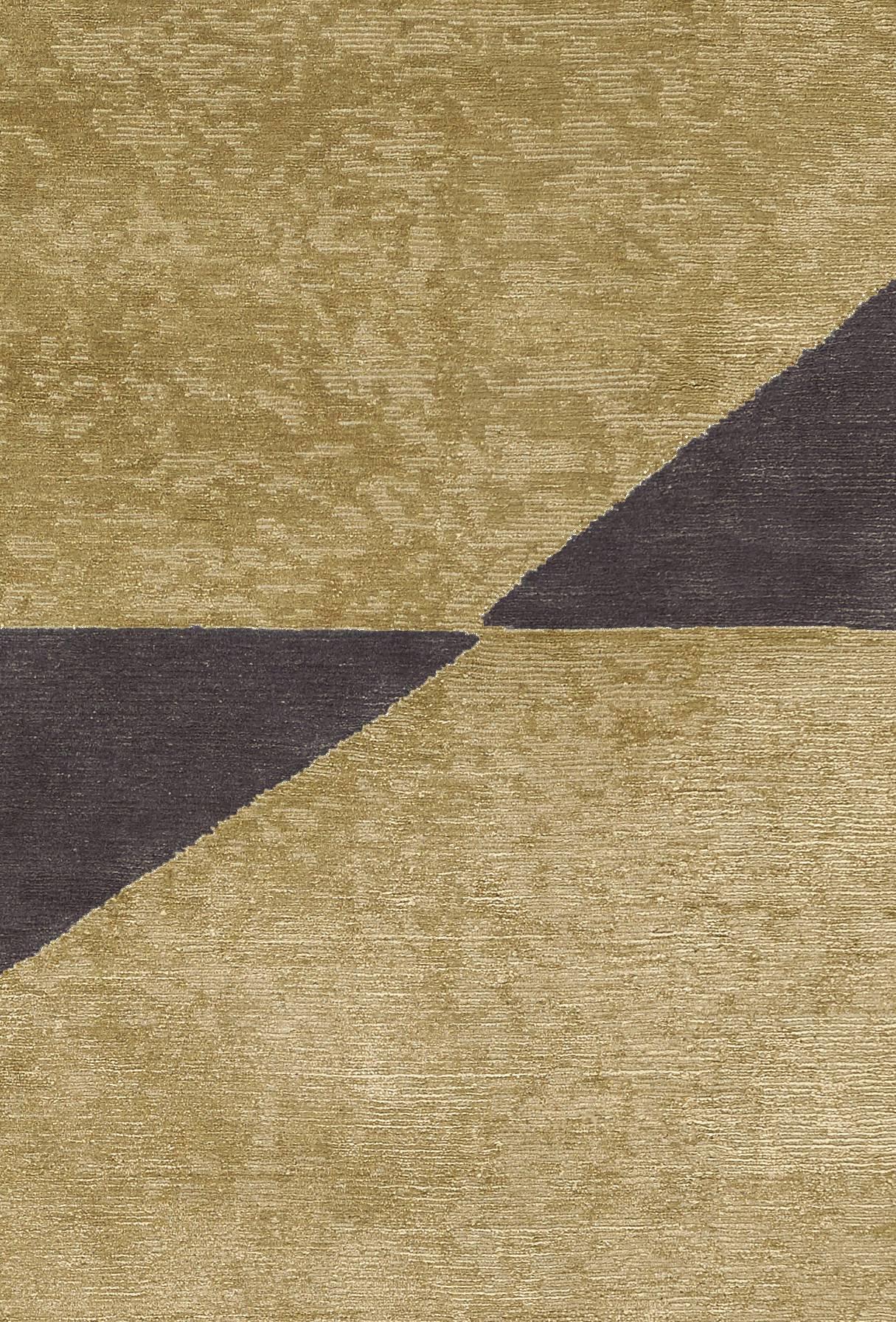 Luxurious Komo rug is made of silk and wool (65-35%) and it has a varying loop and cut texture.
The colors are dark gold and purple-brown.
Low pile (5-6 mm). Quality: 100 knots by square inch.
Hand-knotted in Nepal.
 