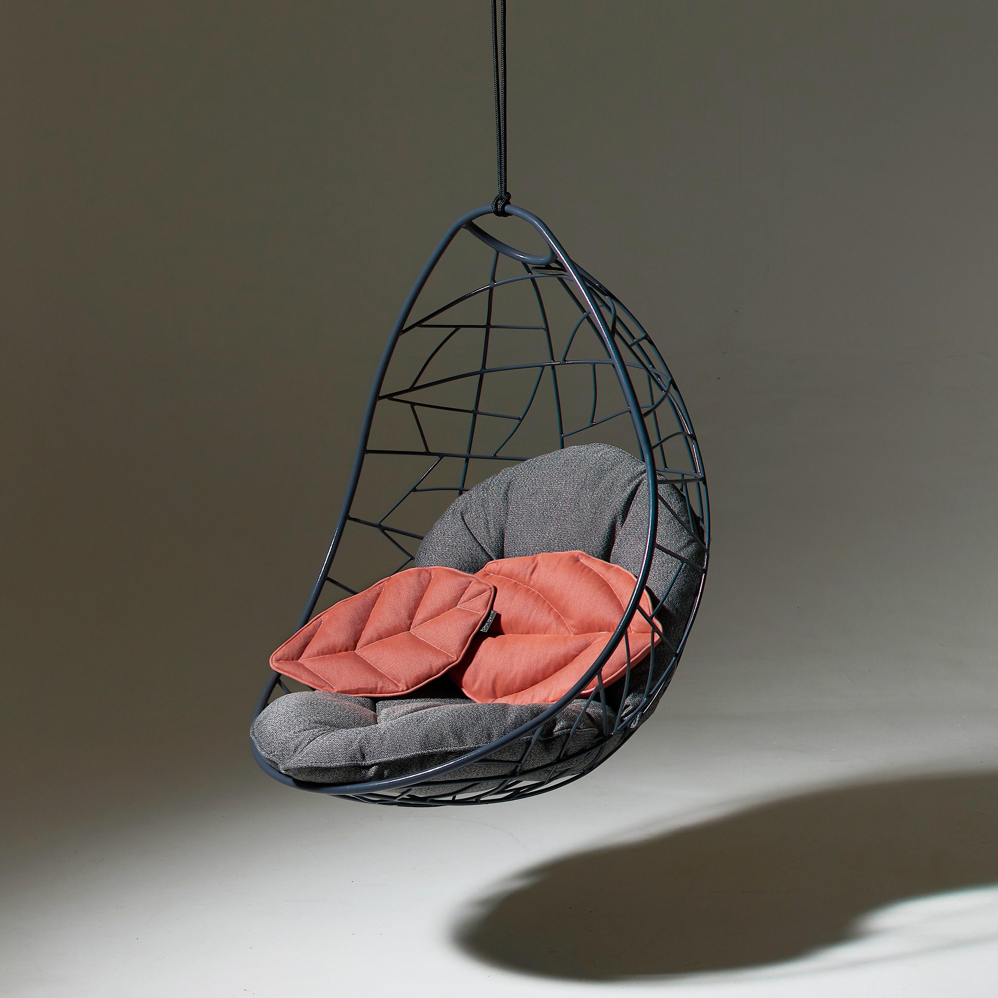 The Nest L'eggs chair is inspired from the organic forms in birds' nests and has a natural egg shape.

The pattern detail is reminiscent of tree branches that intersect, grasses that are intertwined, the veins in dragonfly wings, veins in leaves,