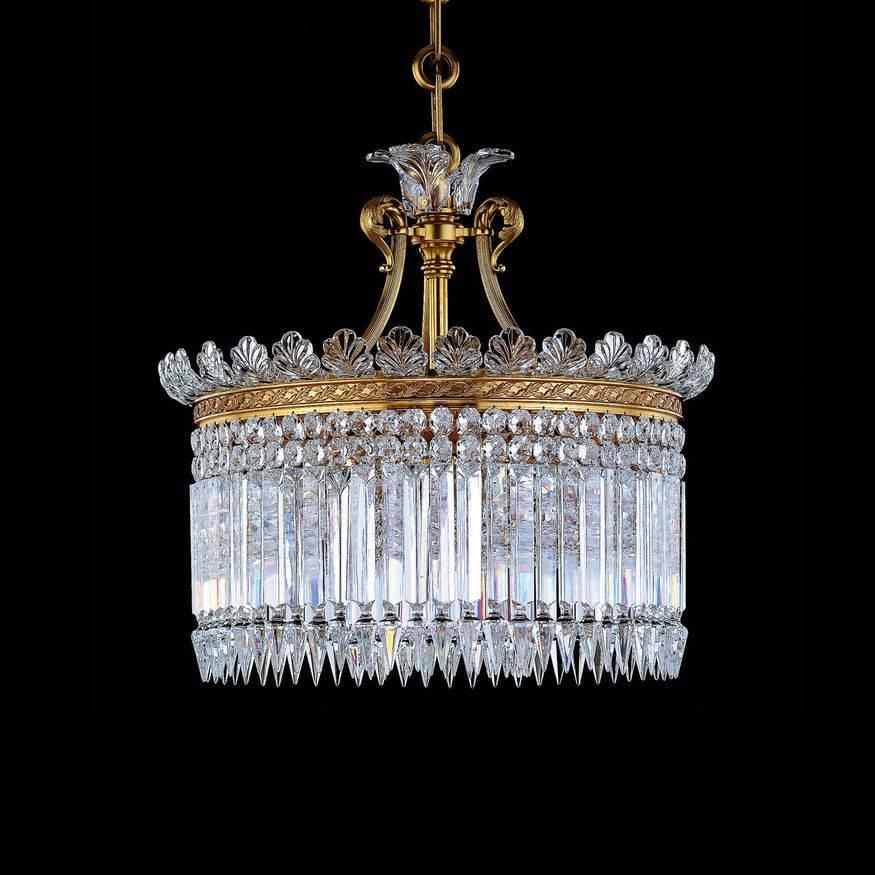 The Baccarat Crinoline crystal chandelier was created at the end of the 19th century and its Classic style inspired by iconic Second Empire petticoats. The Crinoline chandelier fans out on a gilt bronze oval structure supporting a set of large cut