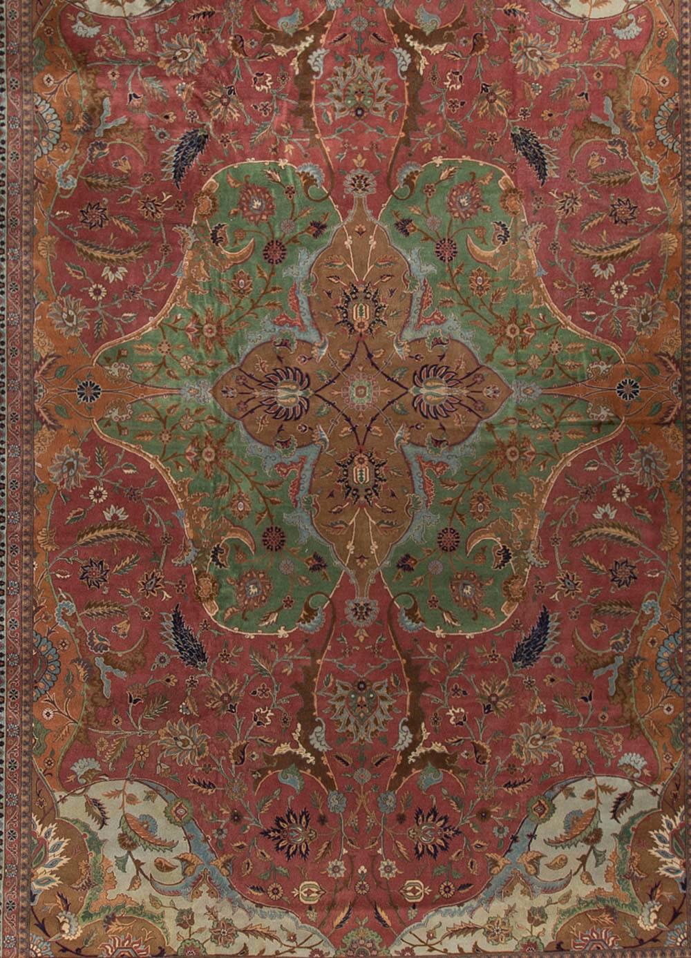 Large Vintage Turkish Sivas Rug circa 1940. The wonderful composition and colors in this rug go to create something very special in look and effect. The green central design enclosing a soft brown medallion with powder blue edges is so well offset