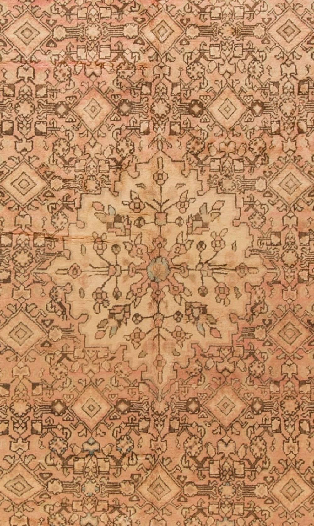 The soft blush colors in the field are complimented so well by the deep black border and coupled with the size of the rug make it most sought after and will be a proud addition to any home. Tabriz is the capital of the north-western province of