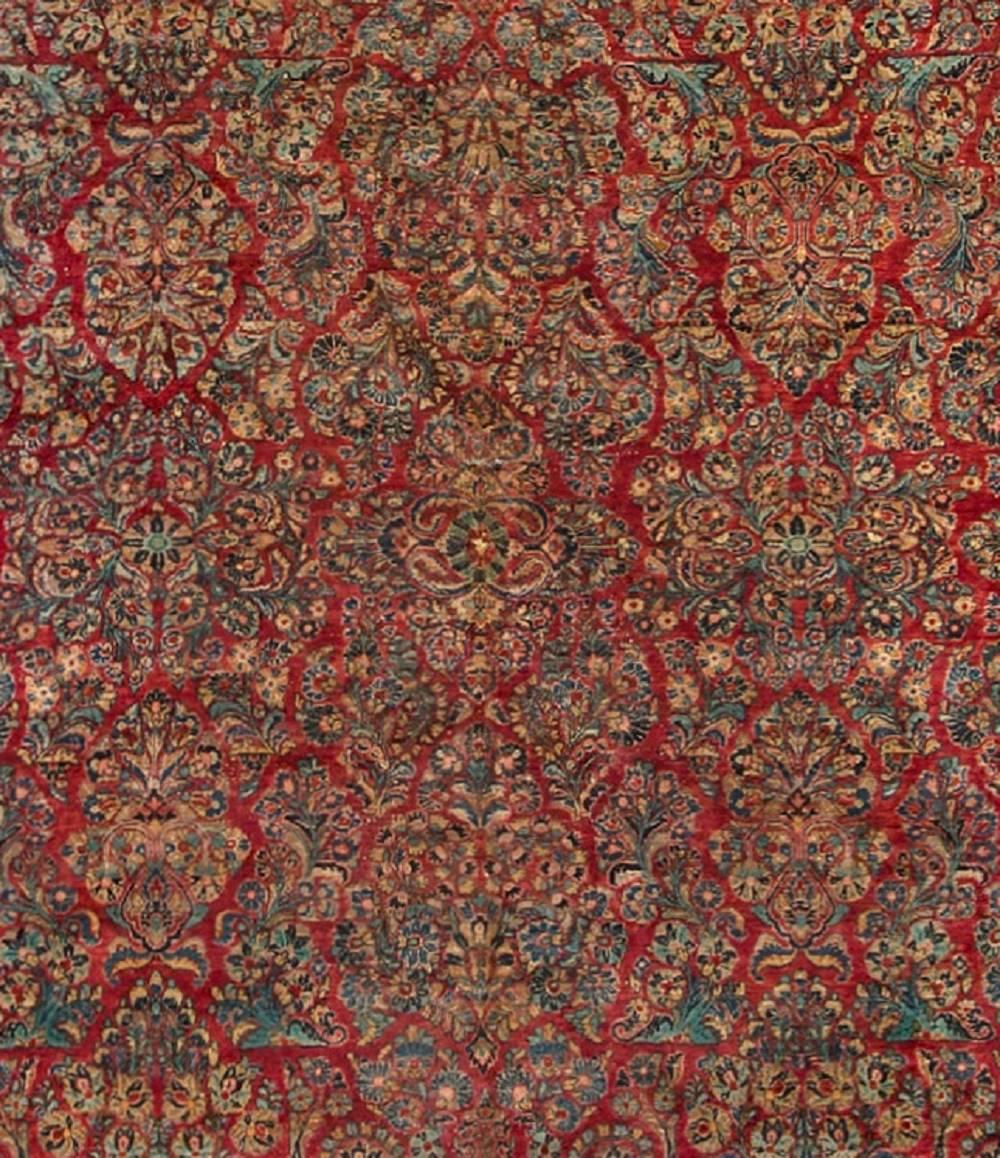 Superb large flower designs fill the main field in this lovely example of the weaving art. The borders and guard borders complete the floral theme to create this impressive piece. Sarouk rugs are from the village of Saruk about 25 miles north of