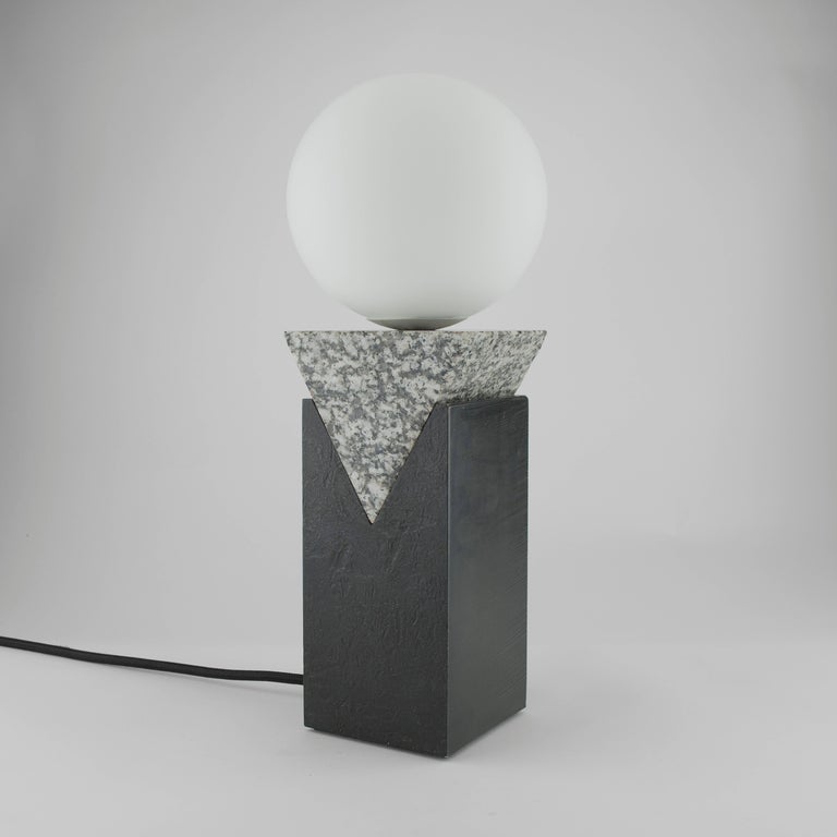 Monument Lamp - Triangle, Luna Pearl Granite, solid steel billet and matte opal glass globe

Louis Jobst' Monument Lamp - Triangle is high quality, bespoke and handmade using solid raw materials. The bases are finished with a black patina and cut