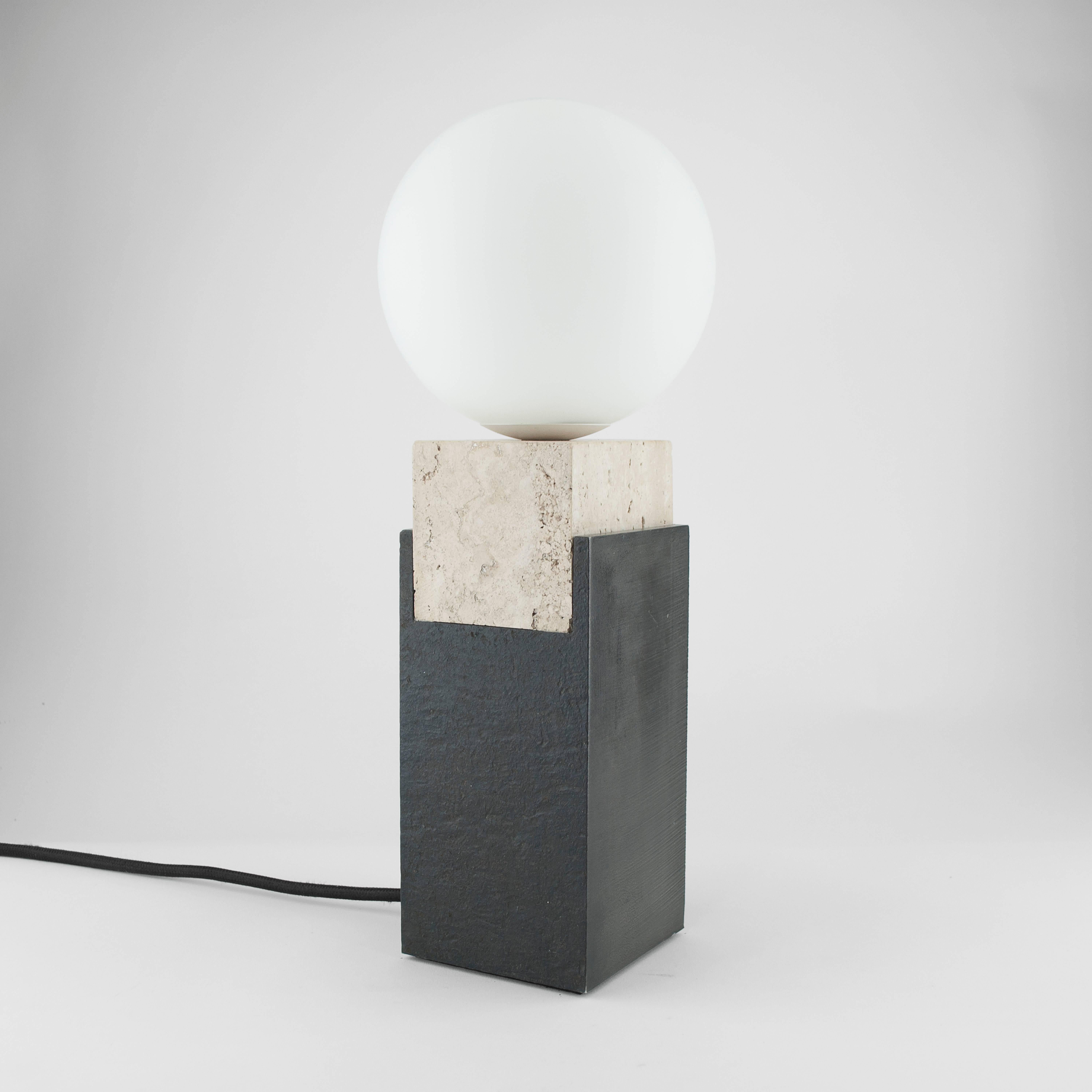 Louis Jobst' monument lamps are high quality, bespoke and handmade using solid raw materials. The bases are finished with a black patina and cut from 90mm thick steel billet. Markings from the process are visible and intentionally left, exposing the