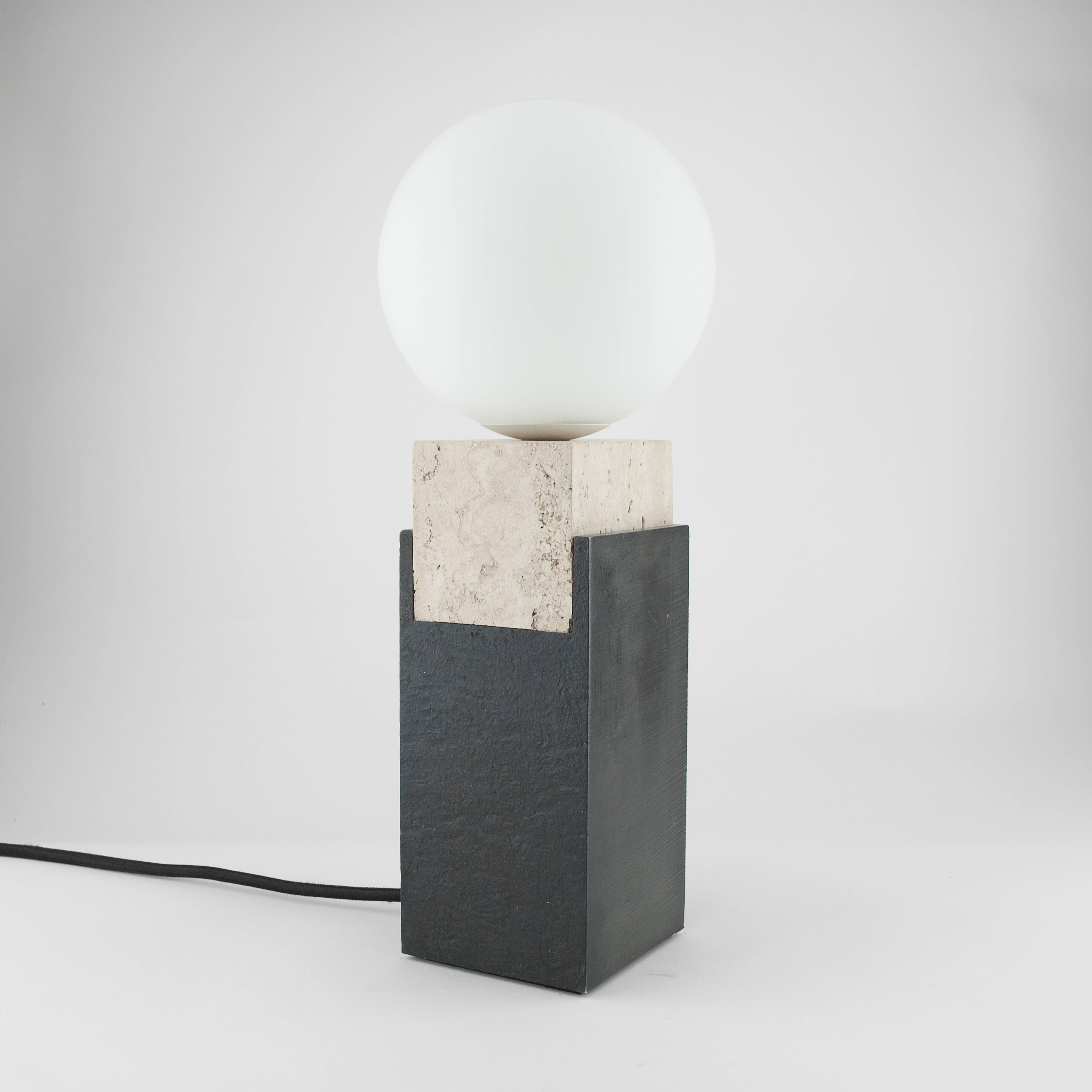 Monument Lamp - Square with Honed Roman Travertine, Solid Steel Billet and handblown Opal Matte Glass

Louis Jobst' Monument Lamp - Square is high quality, bespoke and handmade using solid raw materials. The base is finished with a black patina and