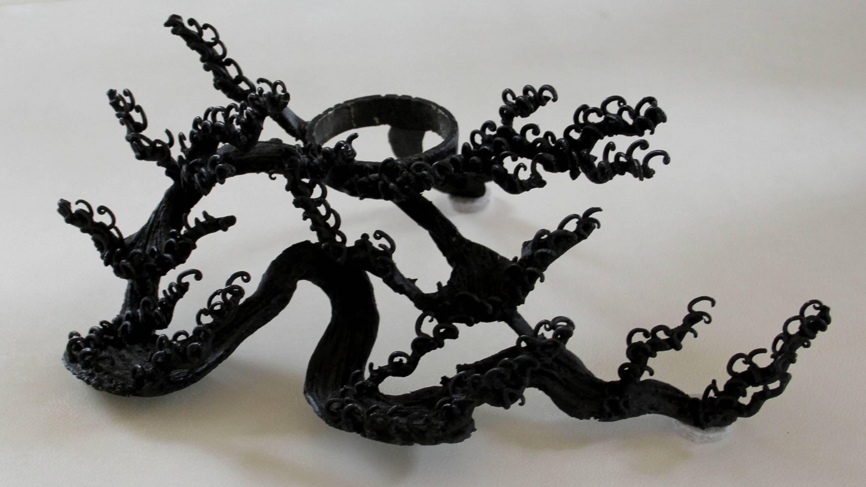This bronze Japanese Usubata depicts the splashing Hokusai waves. It is from the Meiji period, circa 1860. Measures: It is 10.75 wide and 6.5 height. Brown color bronze.

It comes in two parts, the plate and the wave base. 

Usubata refers to