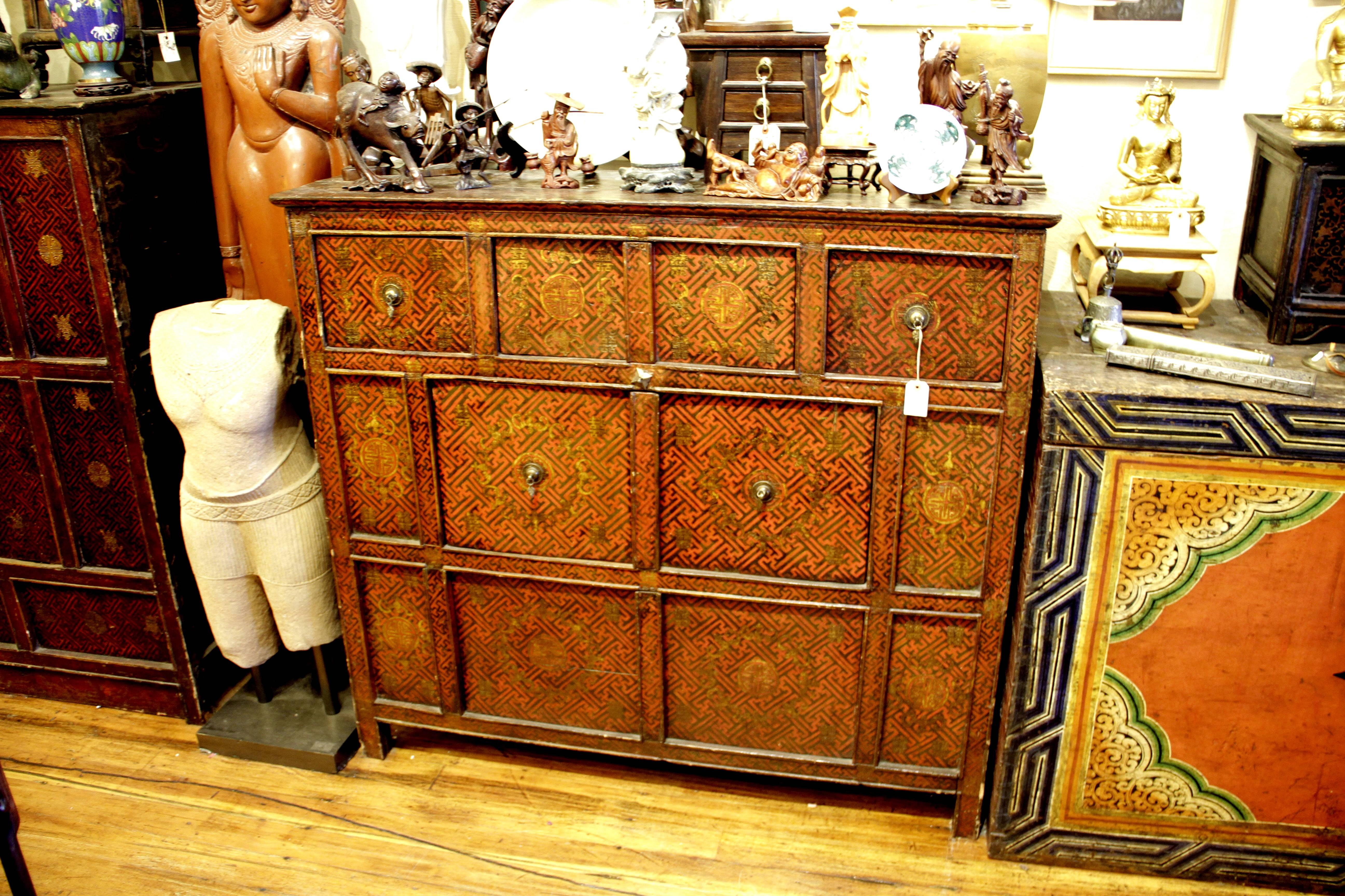 We have a group of Tibetan chests that are all sold individually on our storefront. This group of Tibetan cabinets, small tables and trunks are 100-200 years old and come from monasteries and homes throughout Tibet, Gansu and
