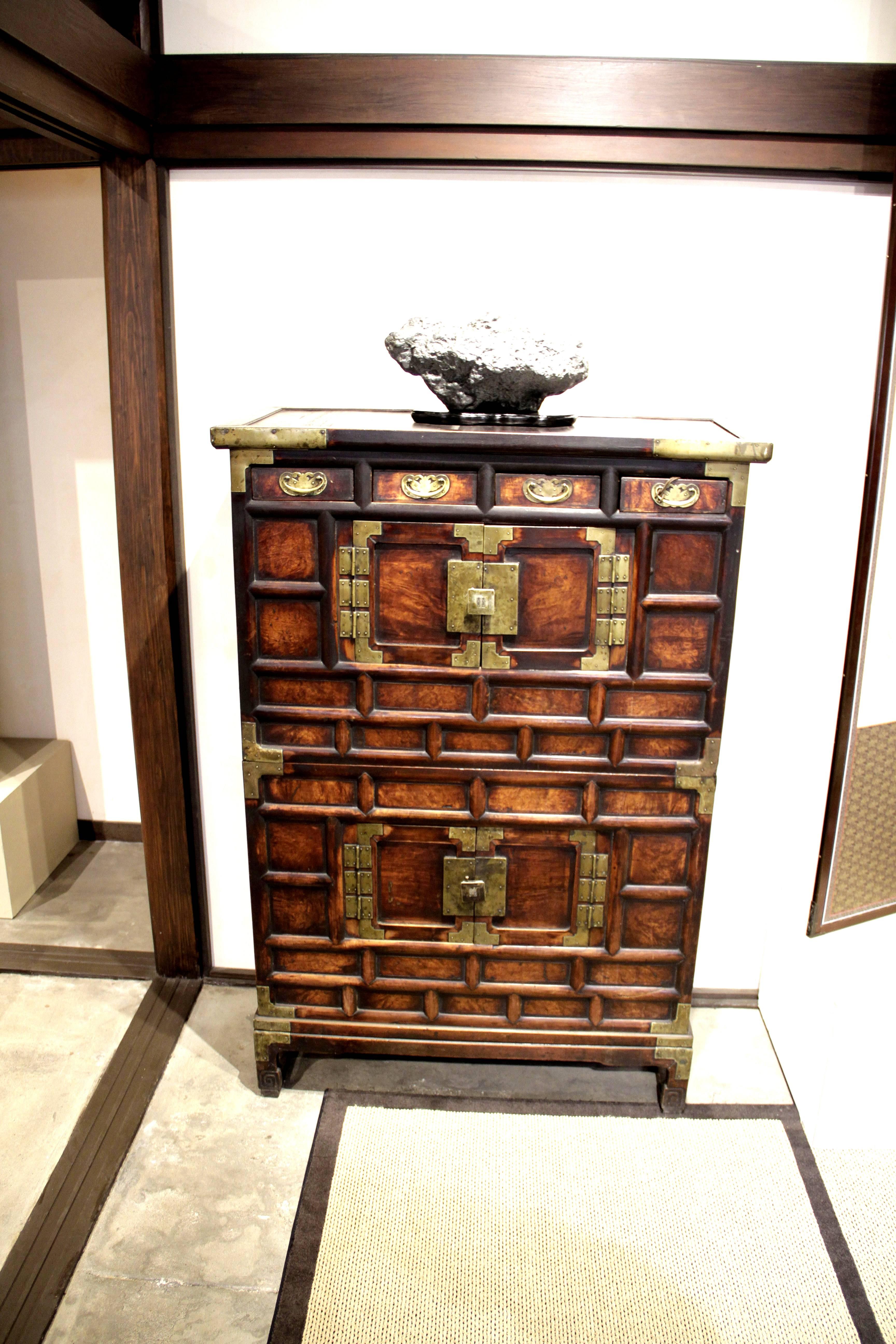 This two section clothing chest is from Korea during the Yi Dynasty circa 1870s, 19th century. It is made of Elm (kouemik) and Pine (sonamu).
Measure: 16.25 D x 36 W x 53 H.
