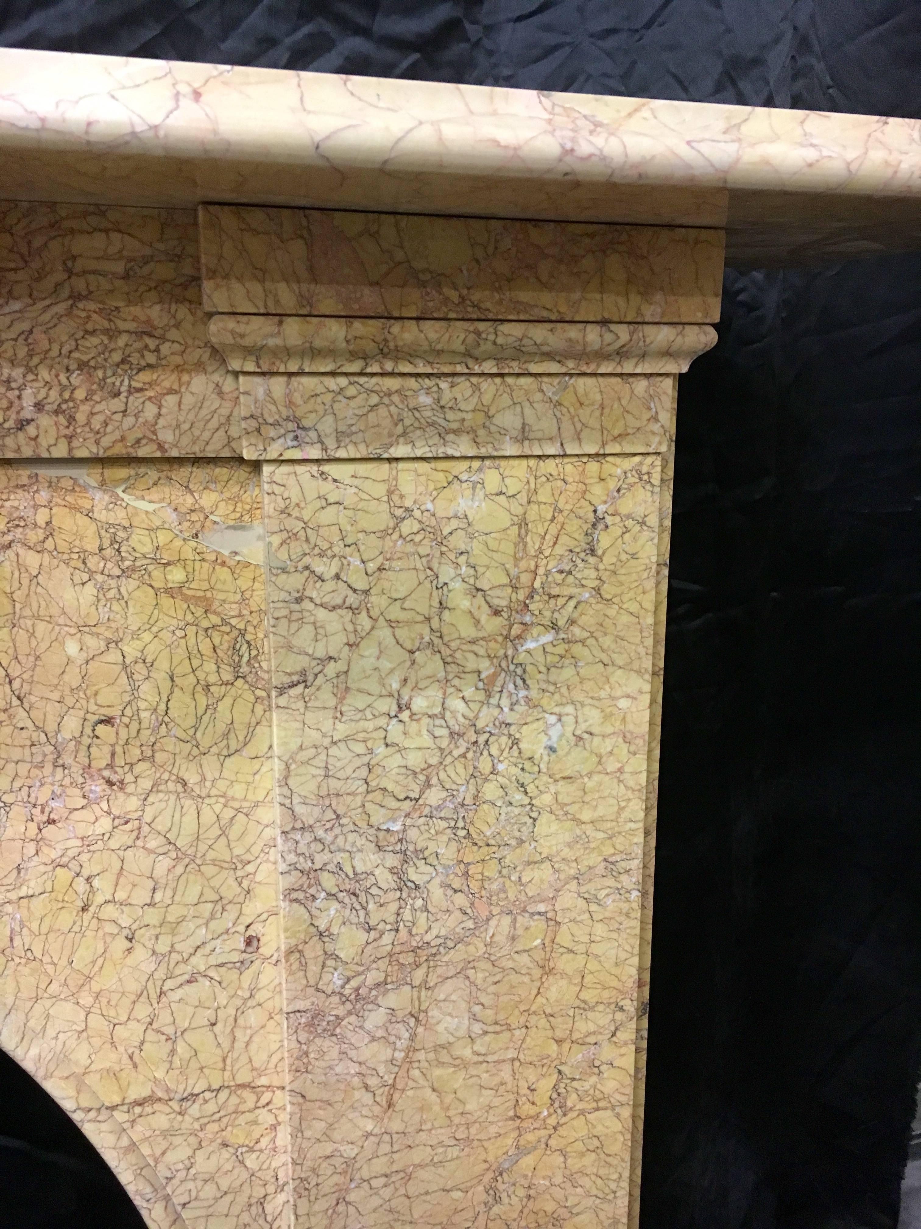 A rare and colourful mid-Victorian Arch spandrel carved in elegant Crema Valencia marble, fully cleaned and restored-and ready to install. English, circa 1855.