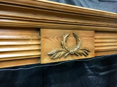 Aged Georgian Style Carved Pine Fireplace Surround.