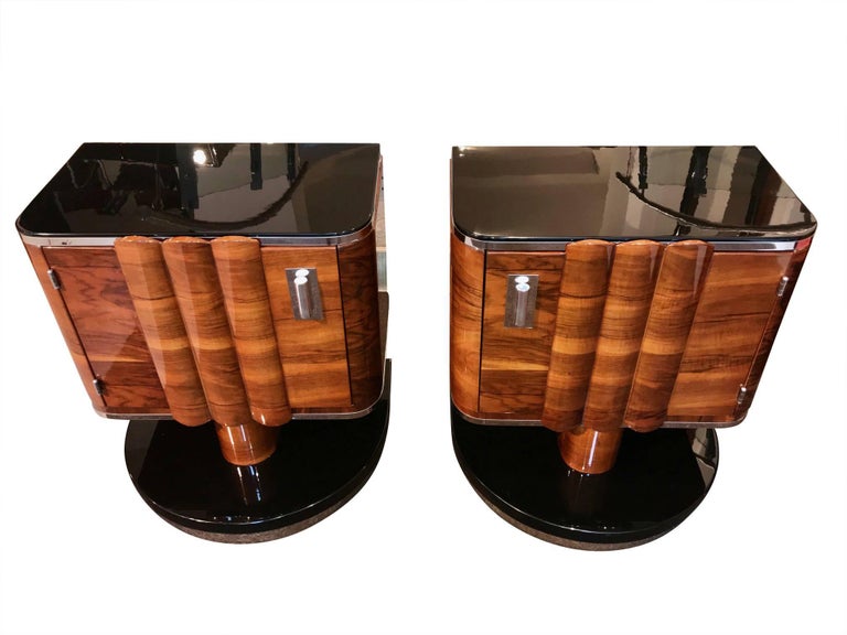 One Pair of original exclusive Art Deco Bedside Tables/Nightstands from France around 1930. 

The bedsides are made of a wonderful walnut veneer and black lacquered wood. They have a great high-gloss lacquer and several chrome-plated metal trims and