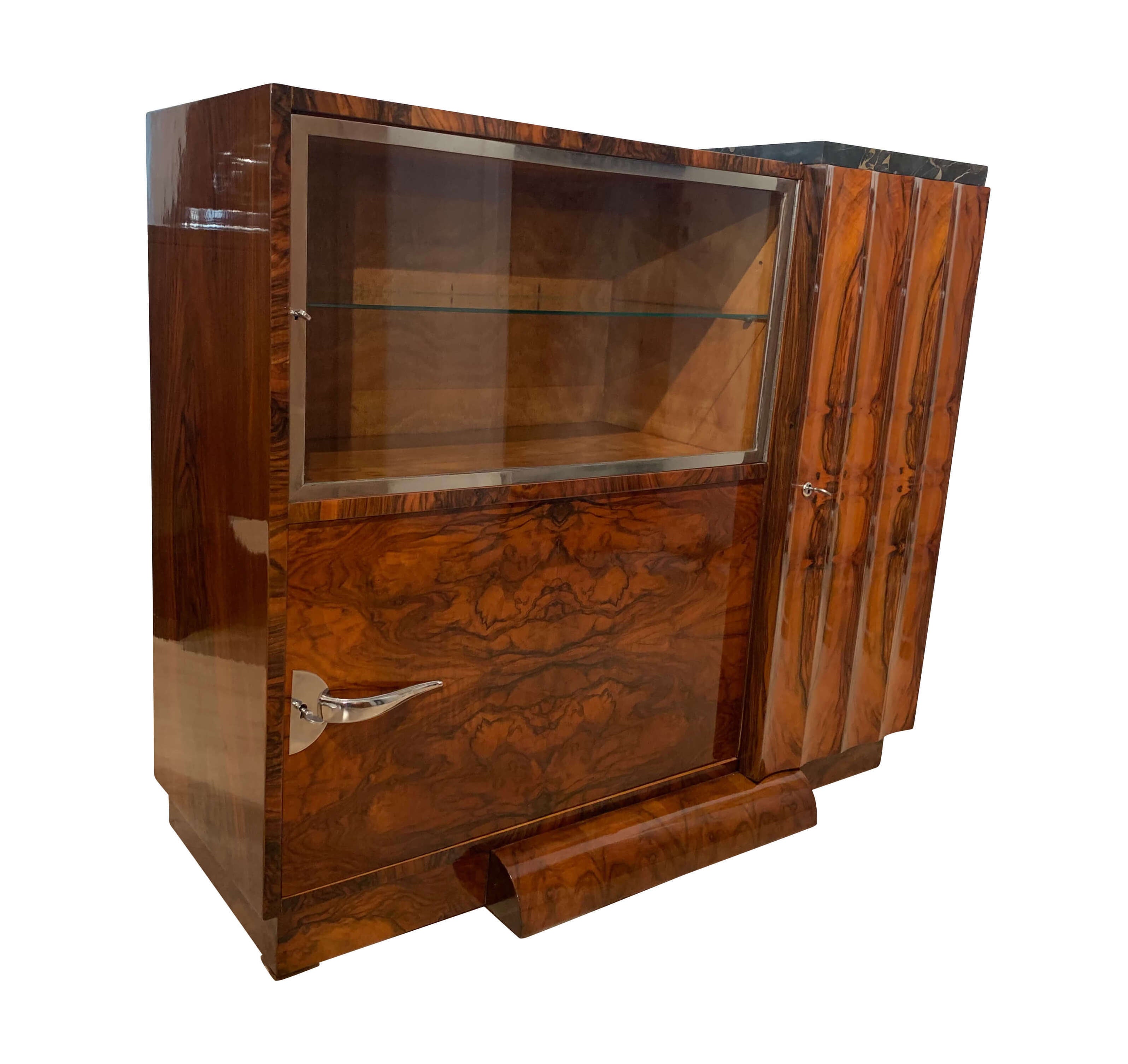 Elegant, rare Art Deco Sideboard  /Buffet from France around 1930.

Wonderful book-matched walnut veneer. Fluted / cannelured door with outstanding walnut veneer pattern, inside with two 2 shelves (stained solid beech). All the wood outside has
