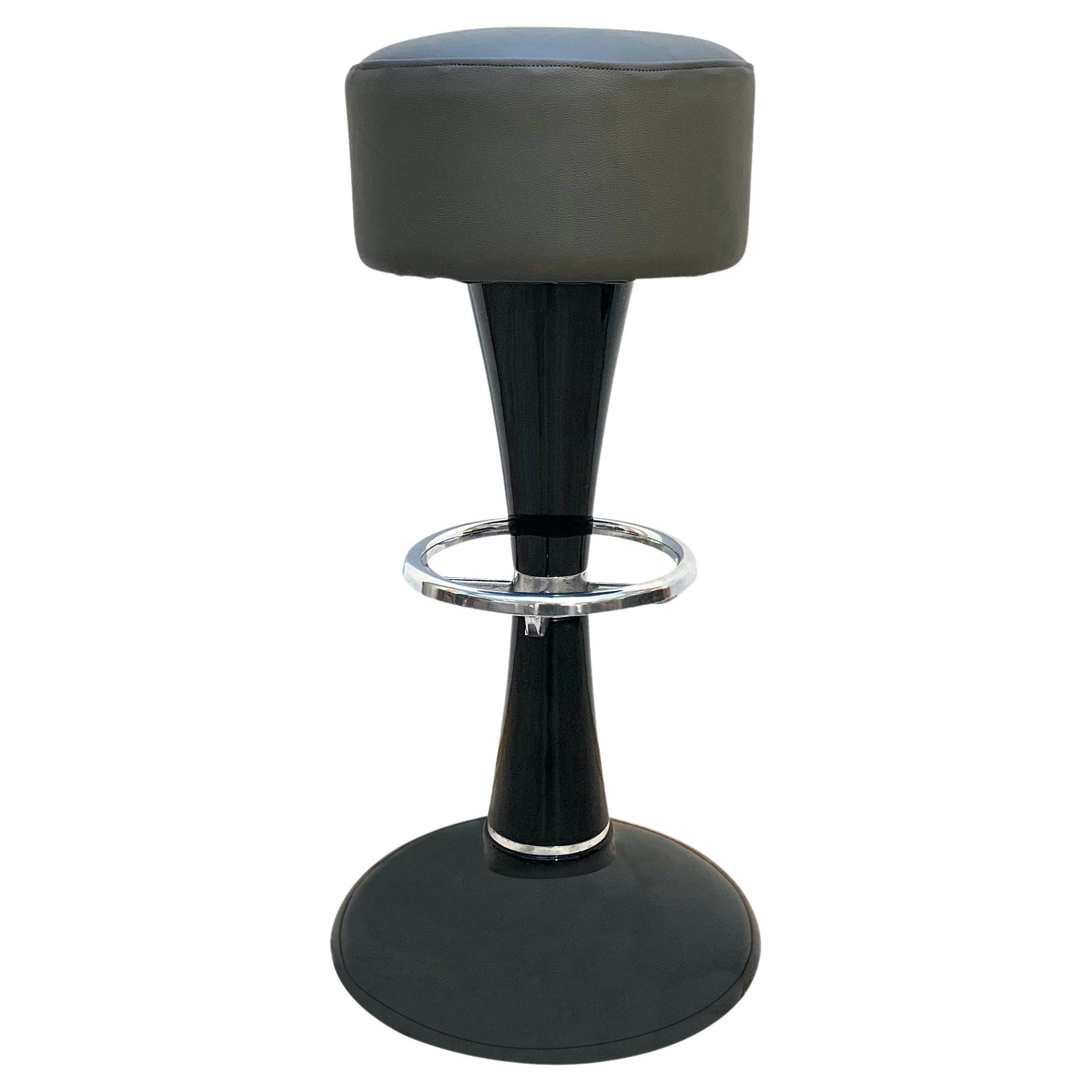 Introducing our exquisite Art Deco Style midcentury bar stools, sourced from France in the 1950s and meticulously restored to their former glory. These stunning bar stools feature a high-quality black lacquer finish on metal frames, with meticulous