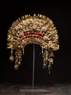 An elaborate Minangkabau gem-set brass floral wedding crown or 'Suntiang'