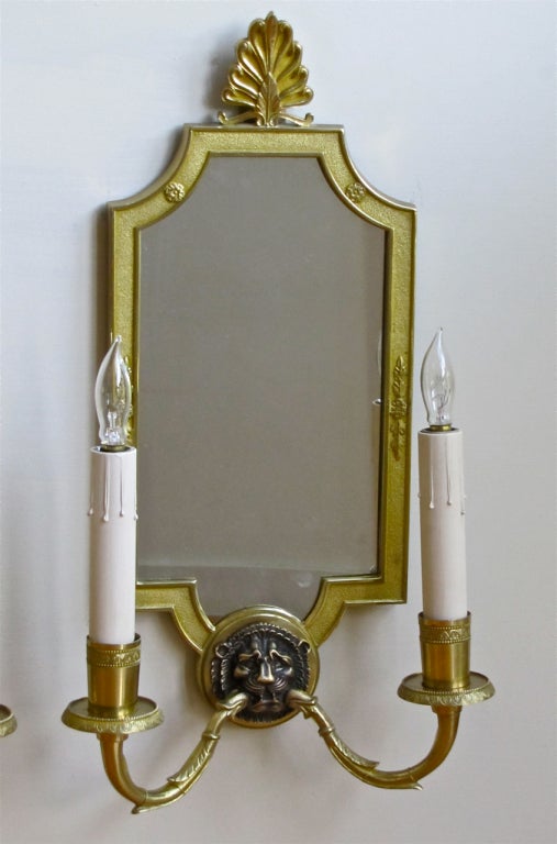 Mid-20th Century Pair of Mirrored Brass French Empire Style Lion Sconces For Sale