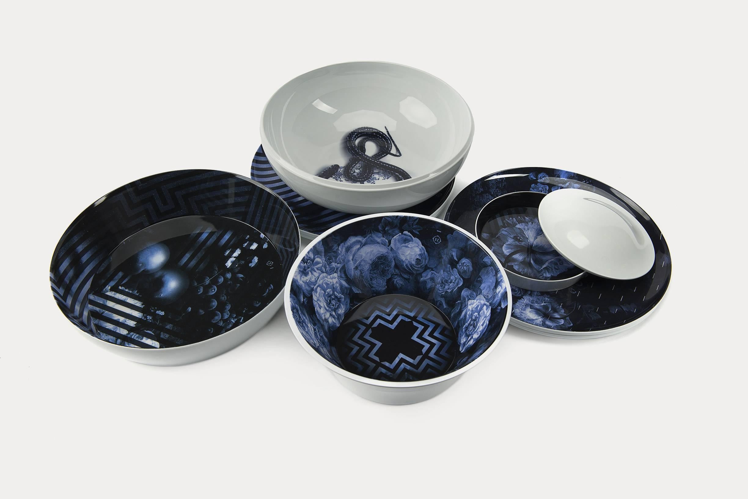 Function meets beauty with Yuan by Ibride. Yuan is a set of eight stackable bowls and plates that stack to form the shape of a vase. Made of melamine, each stackable piece has a different print on the inside. Dishwasher safe. This set comes with