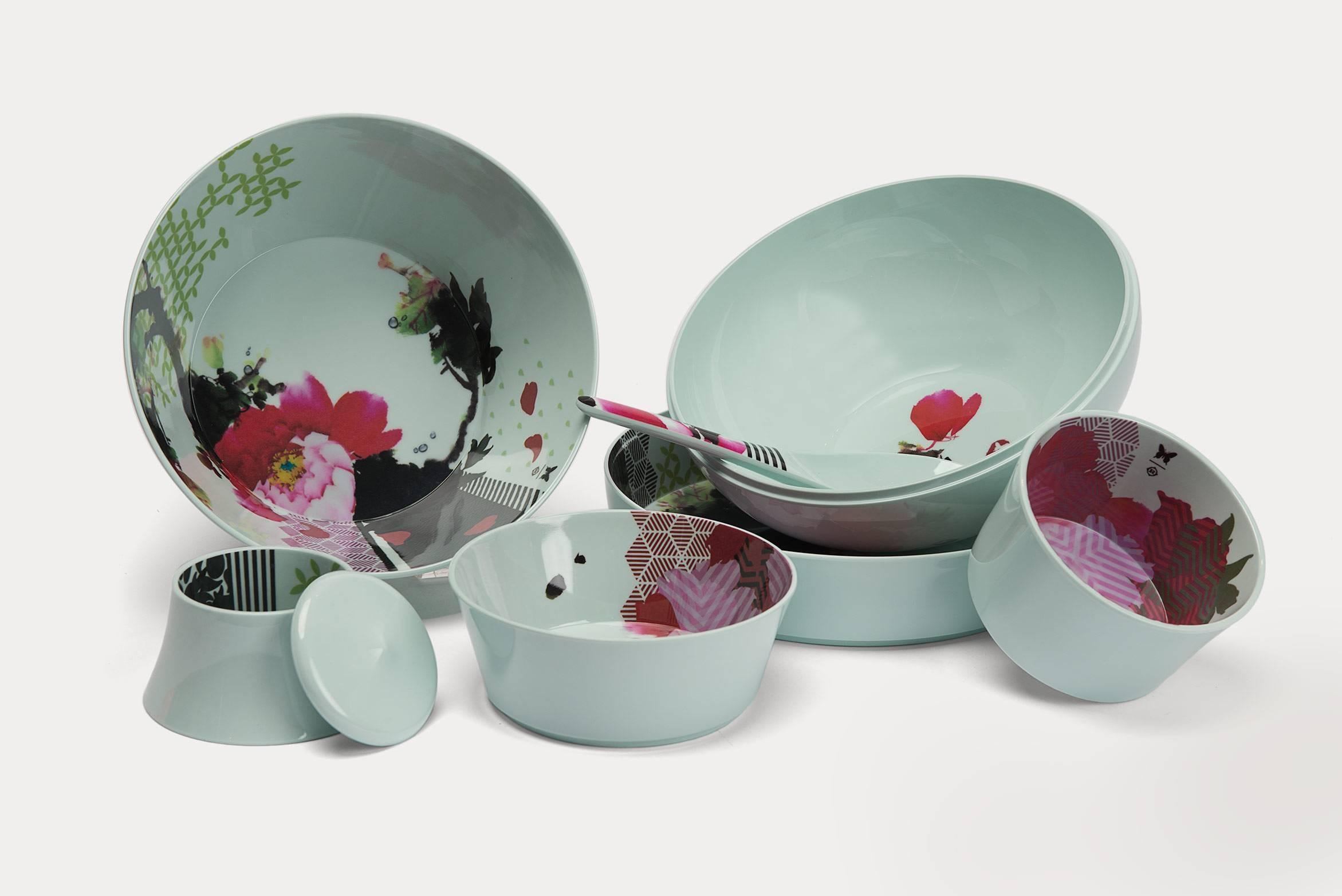 Ming Faux Semblant, by Ibride, is a stackable melamine bowl set which adds a unique design to the home. Function meets beauty with this set of six bowls in various sizes, a spoon and a simple lid to finish the piece. Made of melamine, dishwasher
