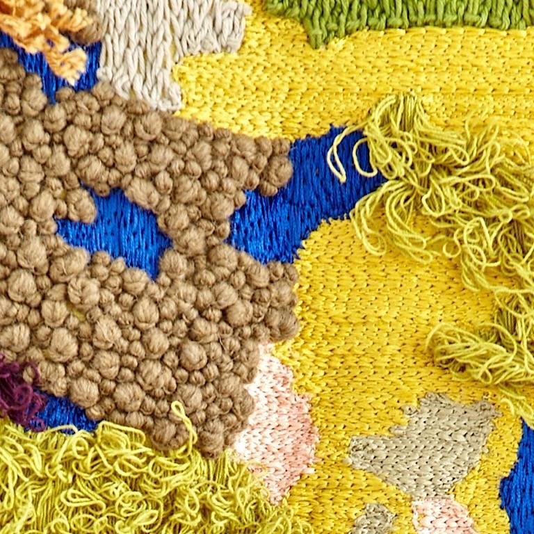 Lakeshore inspired contemporary tapestry.
Fiber art hand embroidered textile.
On a yellow ground a myriad of greens, pinks, ochre, aborigine and hints of electric blue are hand embroidered in various yarns and opaque beads.
Wool cross stitch,