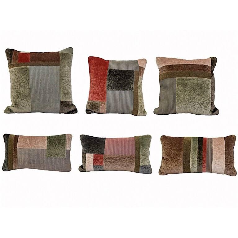 Hand embroidered pillows patchwork of hand quilted velvet embroidered with metallic small round glass beads silk and metallic threads.
Graduated in size three larger square and three small rectangular pillows.
Pale pink, pale green, raspberry pink