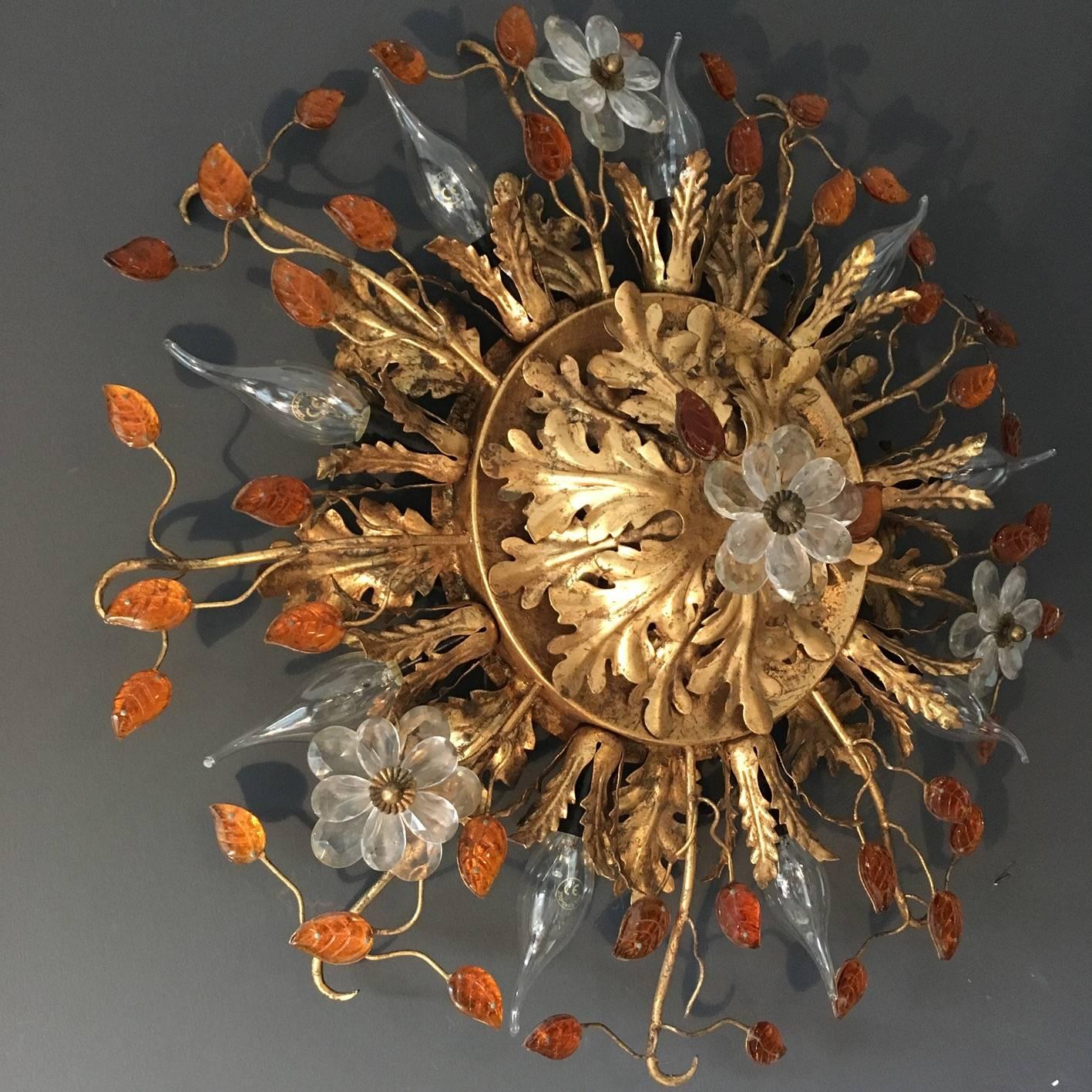 Italian Florentine flush mount ceiling light or wall light

Attributed to Banci Firenze, Italy, circa 1950s

Stunning gold tone acanthus leaf design with clear glass flowers and amber glass leaves on gilt metal stems, glass possible Murano