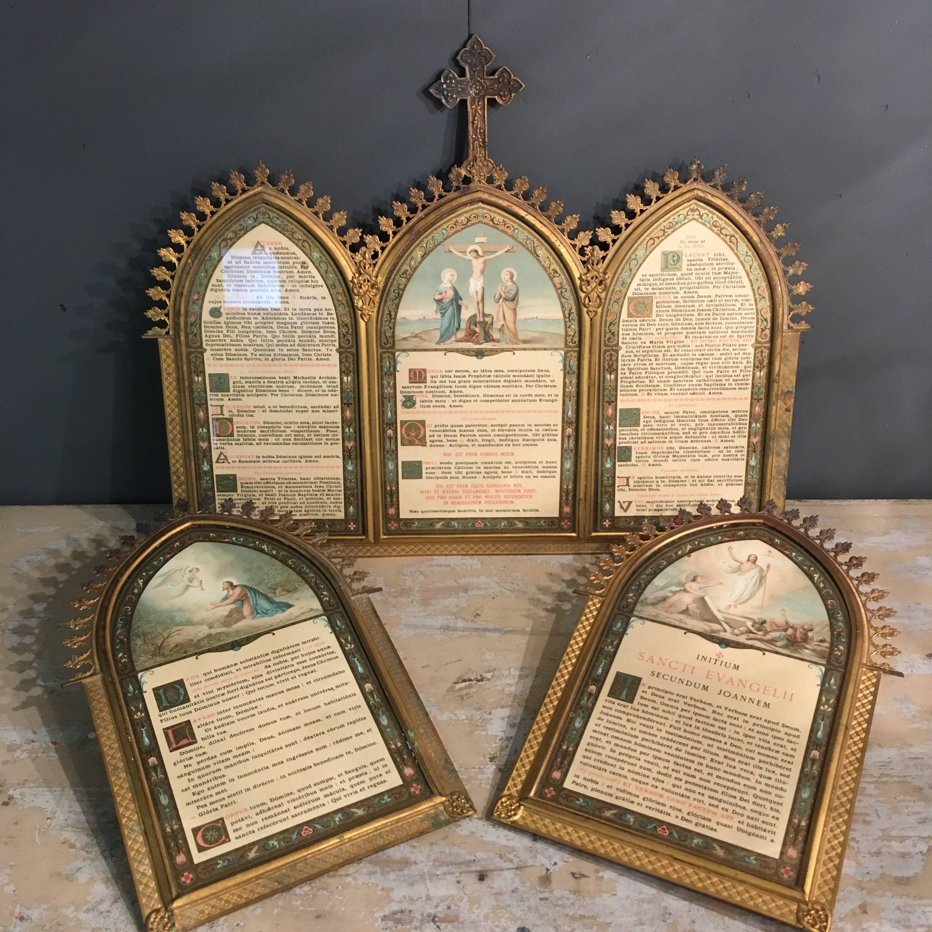 Set of Latin mass altar cards, these would have been used by the priest at mass.

Brass frames with highly decorative shaping and pattern, central frame has a decorative cross at the top

A rare opportunity to find a set of five cards still