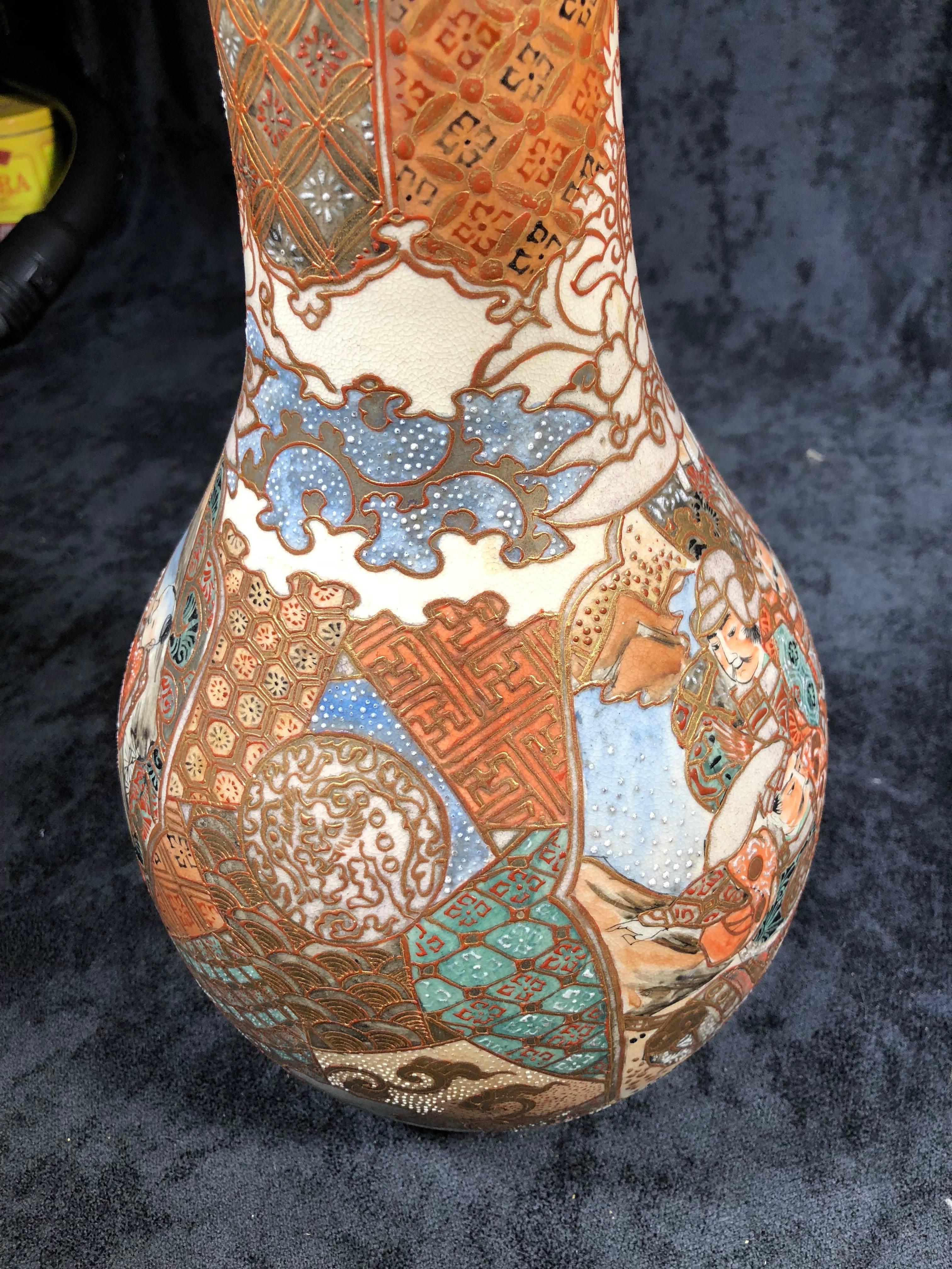Very elegant and well decorated Japanese vase of the late 19th century Meiji period in the Satsuma fashion. Large sized approx 18 inches tall by 7 inches wide.
