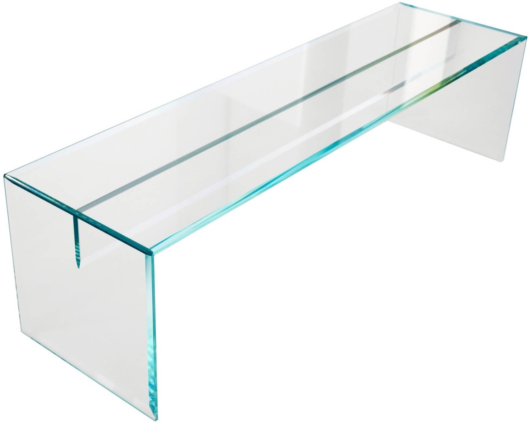 Bench in transparent extra light thick(15 mm), tempered and thermowelded glass. The glass is embellished with special bevelling which reflects and refracts the light, lending the object a rare preciousness. Despite its extreme lightness of form, the