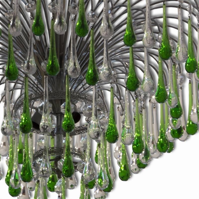 Italian Murano teardrop chandelier, made in the 1950s. Features a brass frame with clear green-white Murano teardrop crystals. New wiring,  fully functional.  In excellent condition 