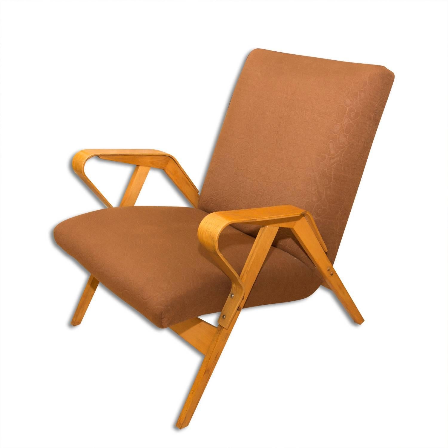 A pair of Czechoslovak bentwood lounge armchairs produced by Tatra Nabytok, Czechoslovakia in the 1960s. The design of these chairs followed the huge success of the Czechoslovak pavilion at the Brussels Expo 58.
They were restored in the past with