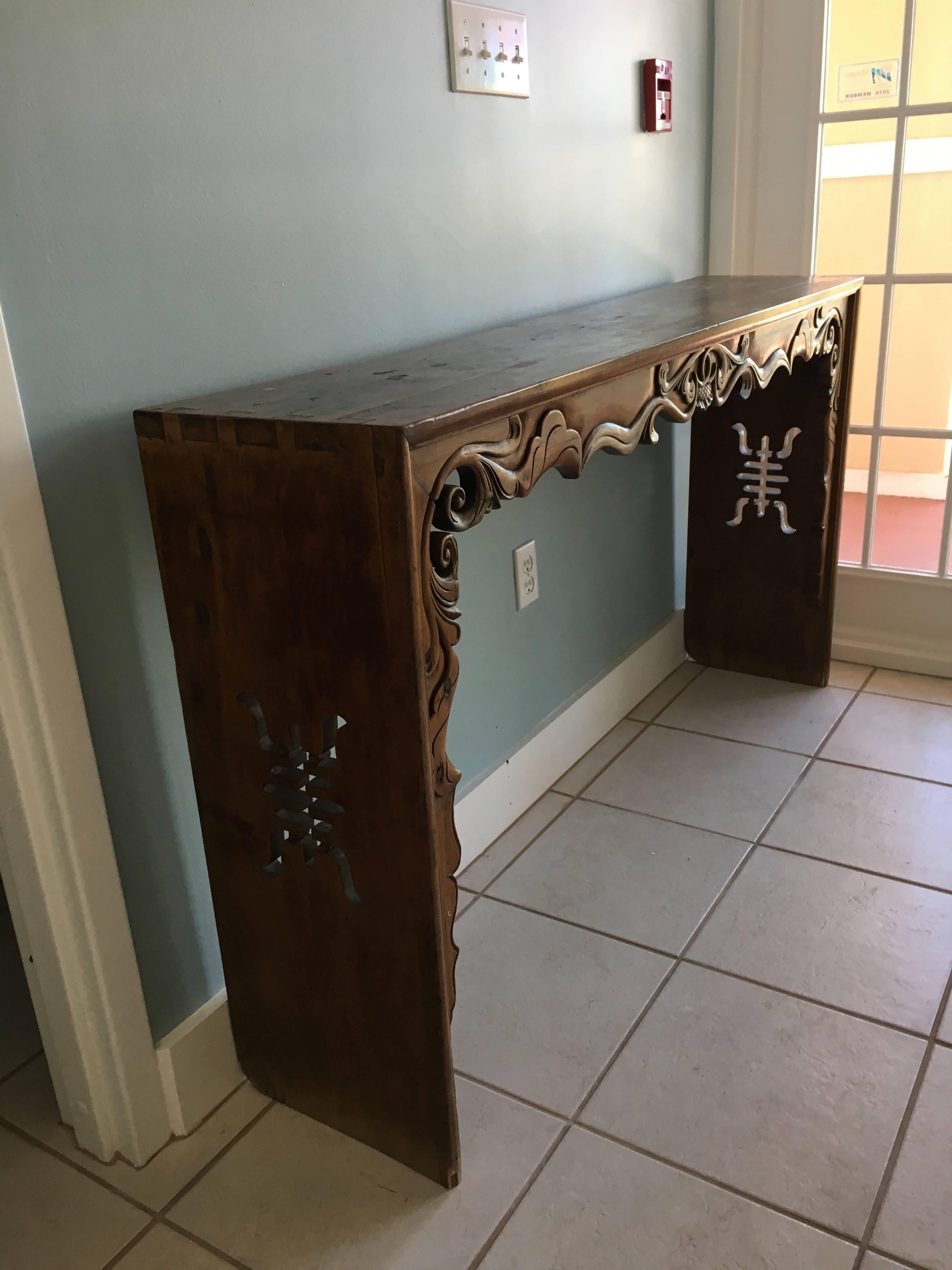 Fine carved Chinese altar table a very desirable size handmade with walnut wood two sided, well carved apron to the front pierced design on side panels.