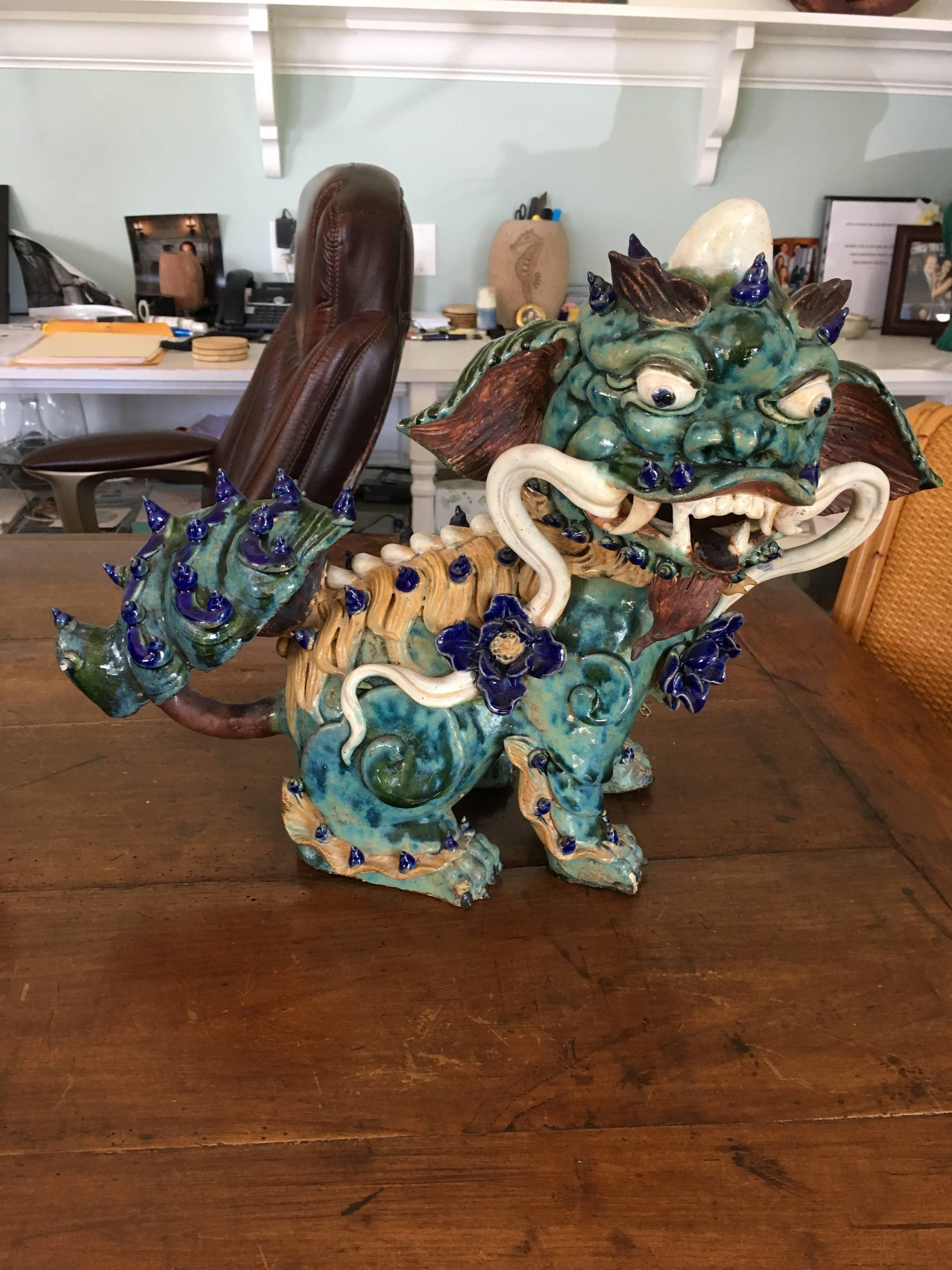 This pair of foo dogs came from Shi Wan Kiln in Guangzhou China Made by Yuhua Ceramic Company Leaded glazes (The company was closed during the war and reopened after 1980).