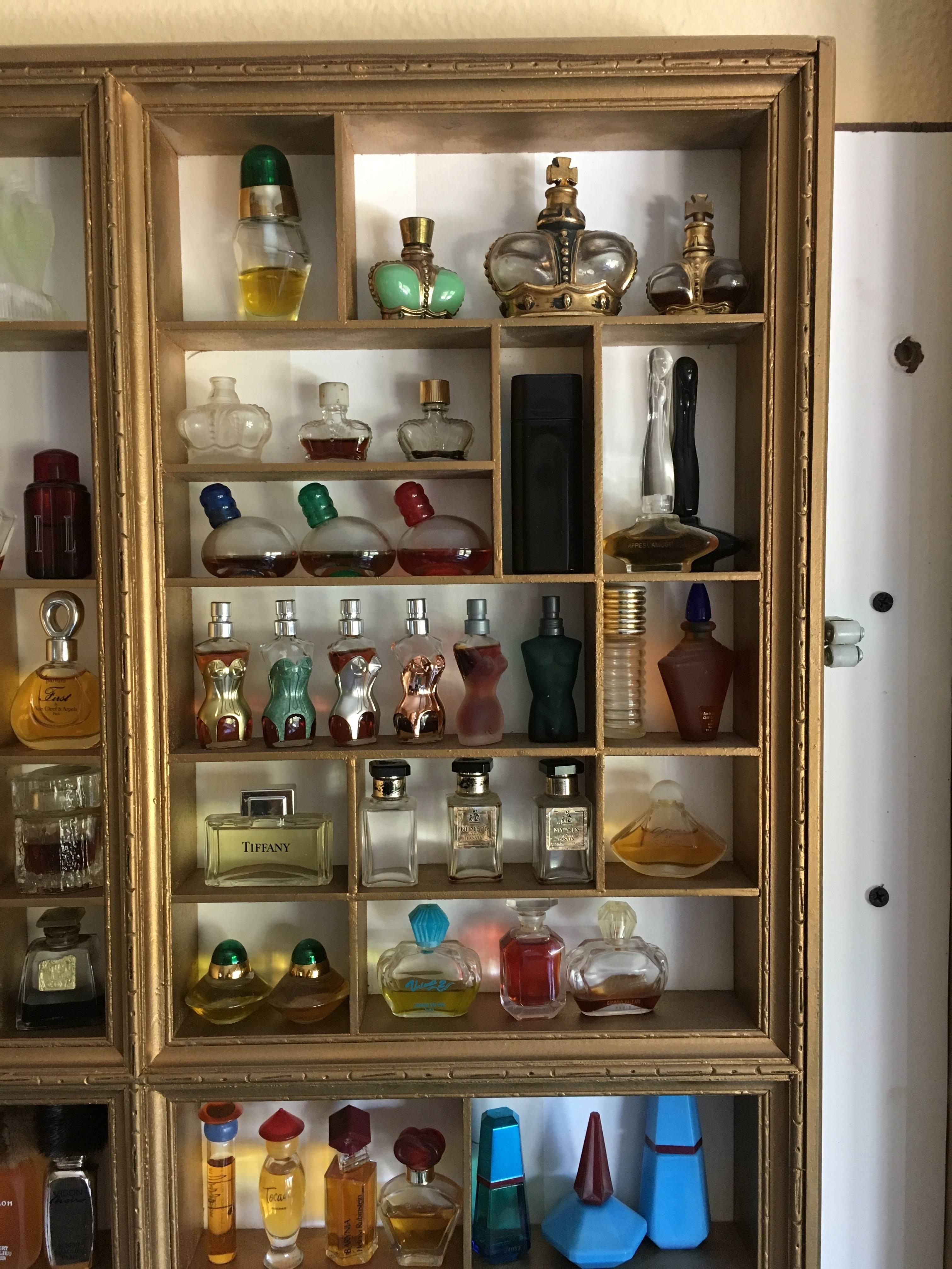 Pair of Antique "Frames" Display and Perfume Bottle Collection