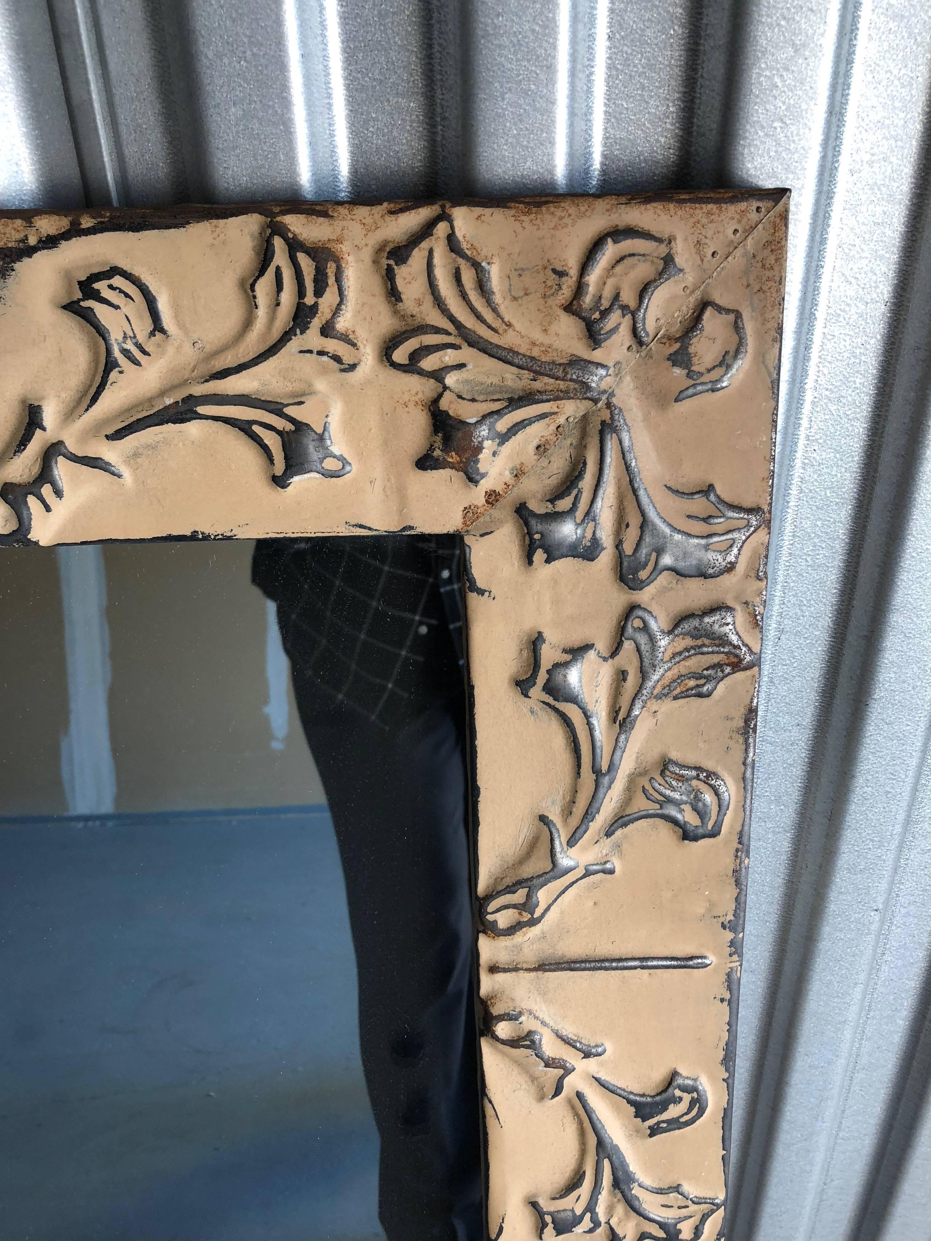 Well made mirror made from old ceiling tile frame with insert of very good mirror hang up or sideways!