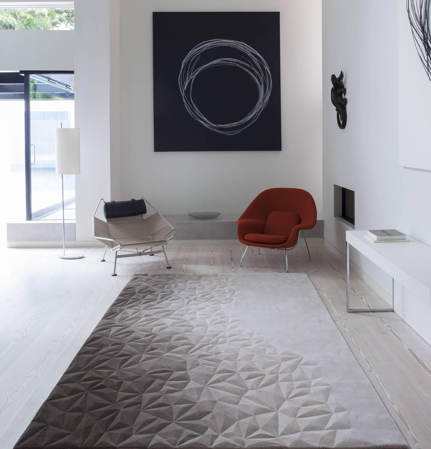 Iconic hand-tufted wool rug featuring ombre colouring and surface hand-carving. Designed by Topfloor's Creative Head and Founder, Esti Barnes. Contemporary classic available to order in any size, colorway or shape. Winner of Interior Design