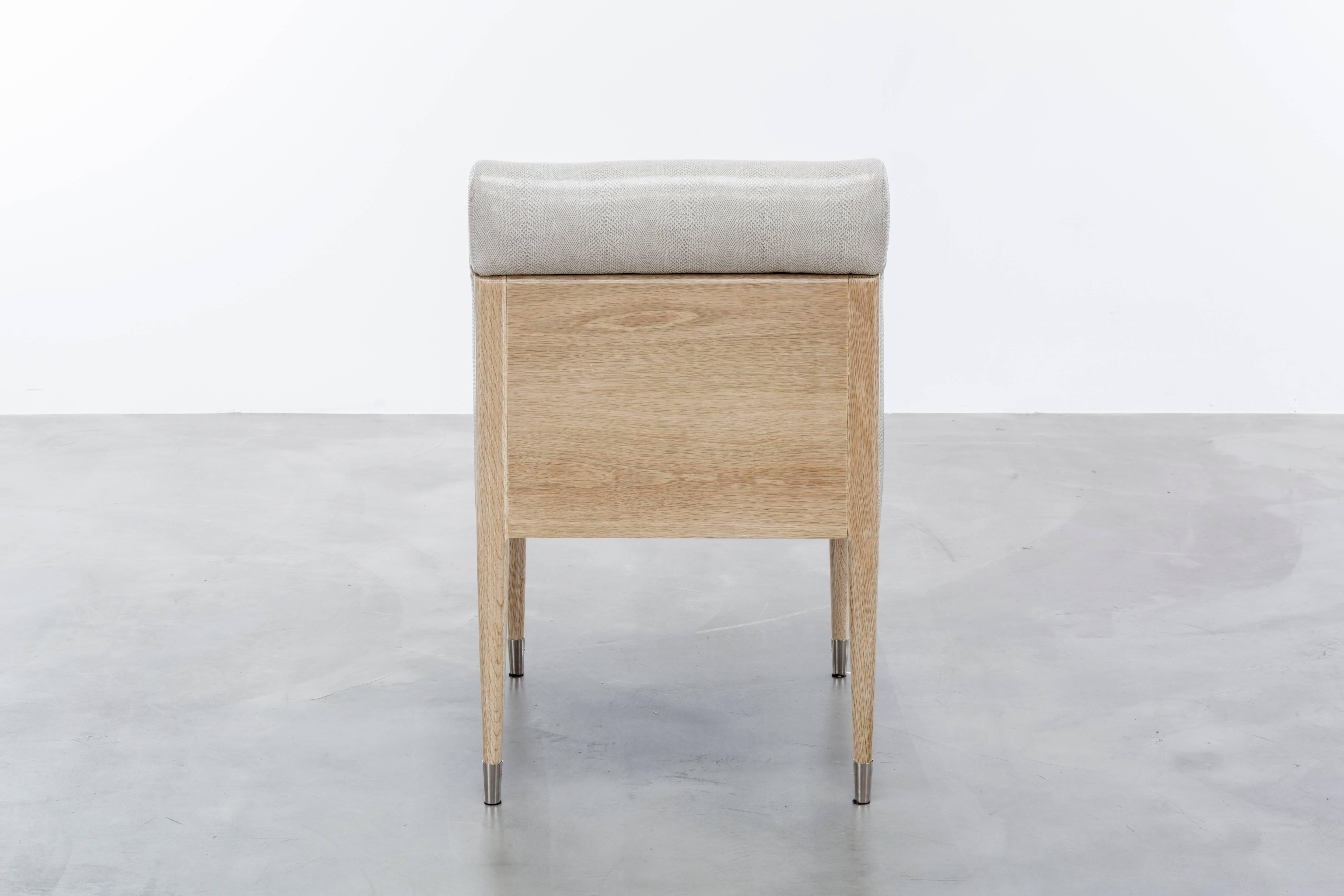 American HERVE CHAIR - Minimal Modern Chair with a Wood Frame and Metal Ferrules.